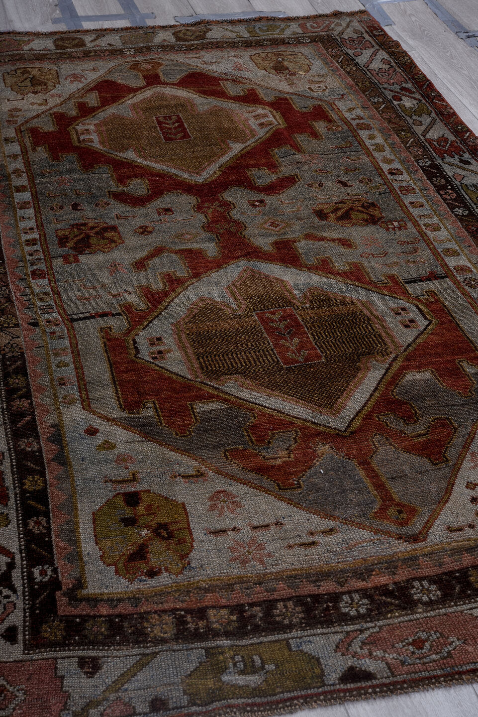 4' x 7' one-of-a-kind handmade antique Kurd medium size rug. Color palette: ivory, rust, charcoal, camel, olive, rose, taupe