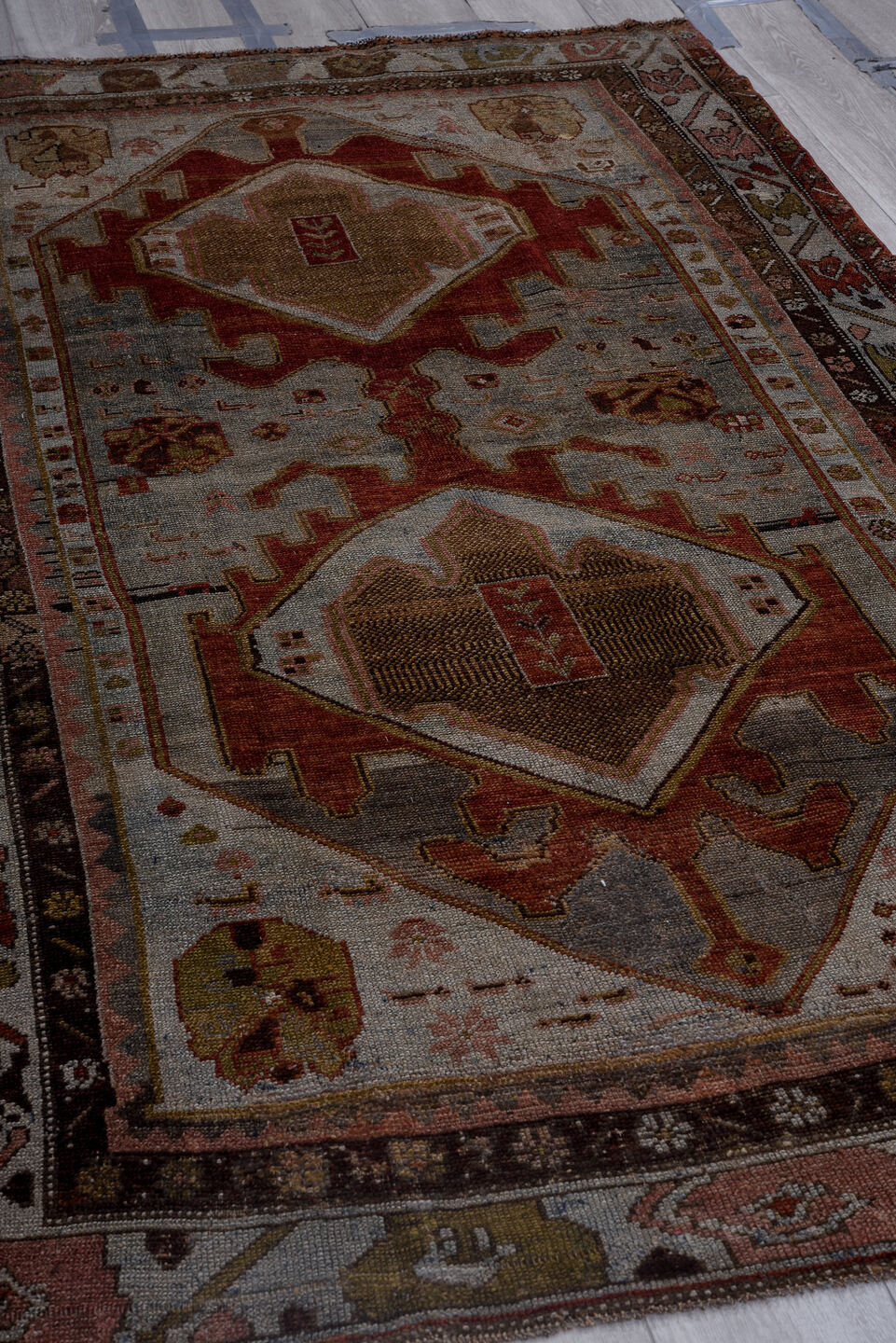 4' x 7' one-of-a-kind handmade antique Kurd medium size rug. Color palette: ivory, rust, charcoal, camel, olive, rose, taupe