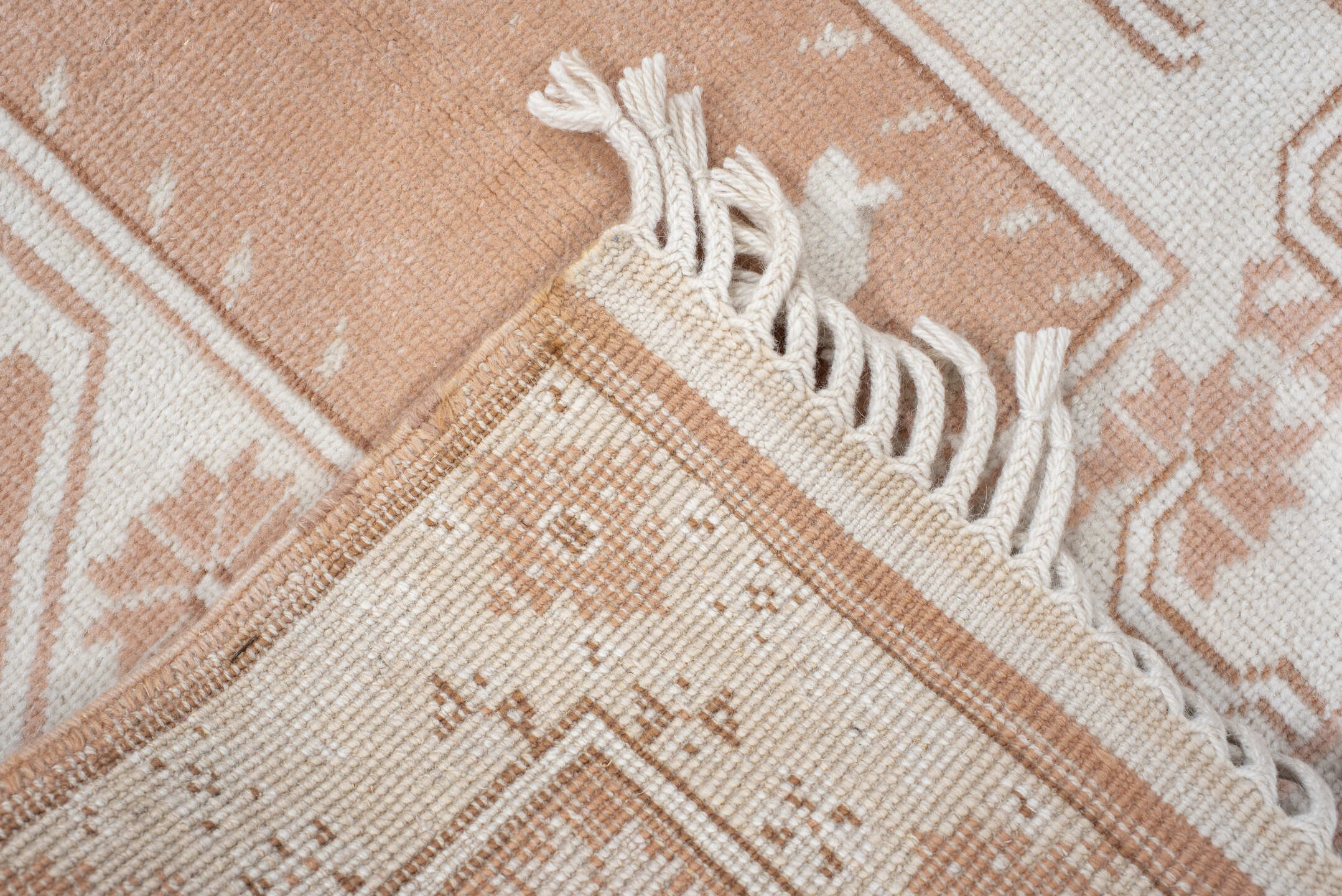 2' x 4' one-of-a-kind handmade antique Anatolian small size rug. Color palette: ivory, blush, peach, sand, camel, pink