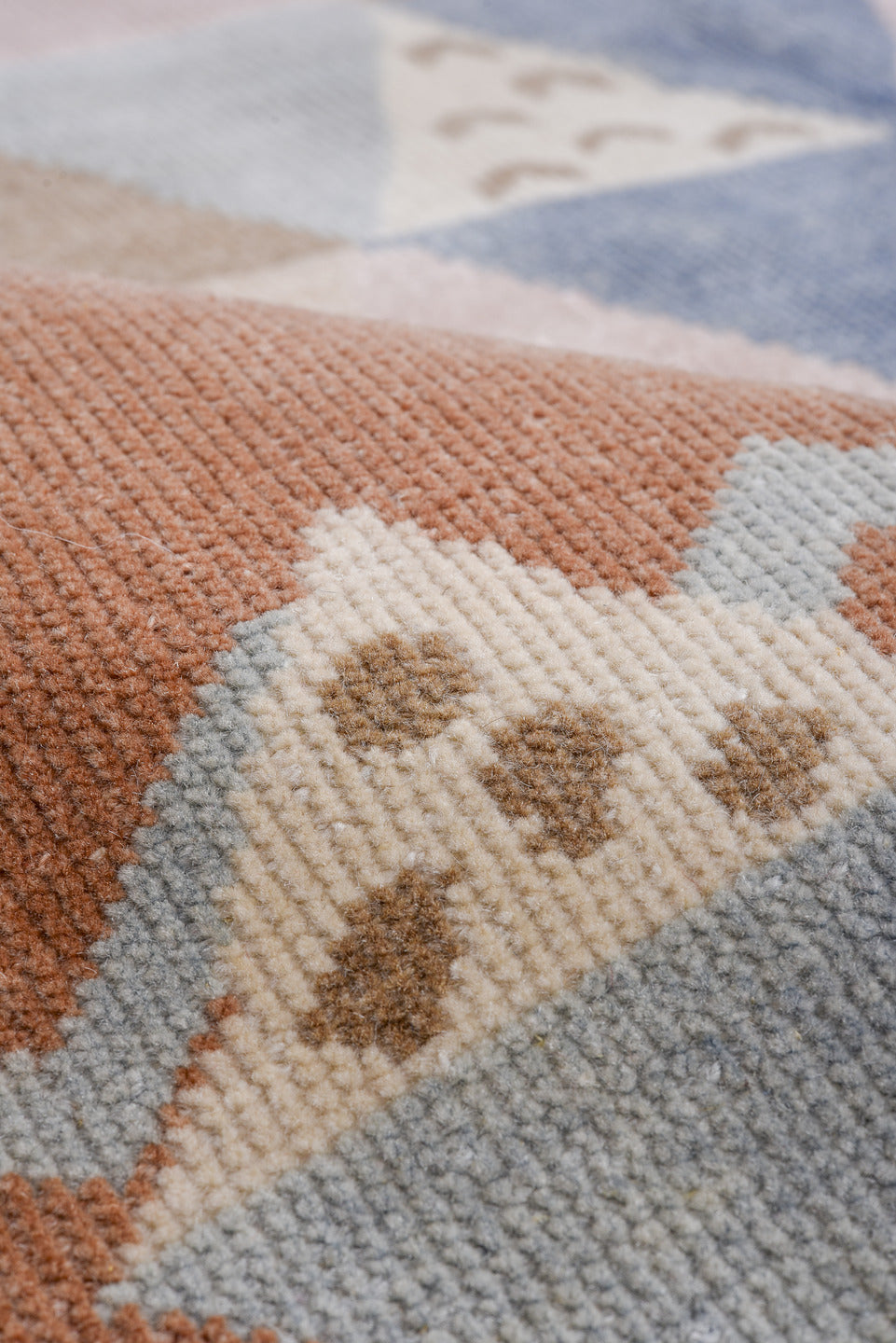 5' x 6' one-of-a-kind handmade antique Art Deco rug. Color palette: terra cotta, ivory, powder blue, taupe, blush, navy