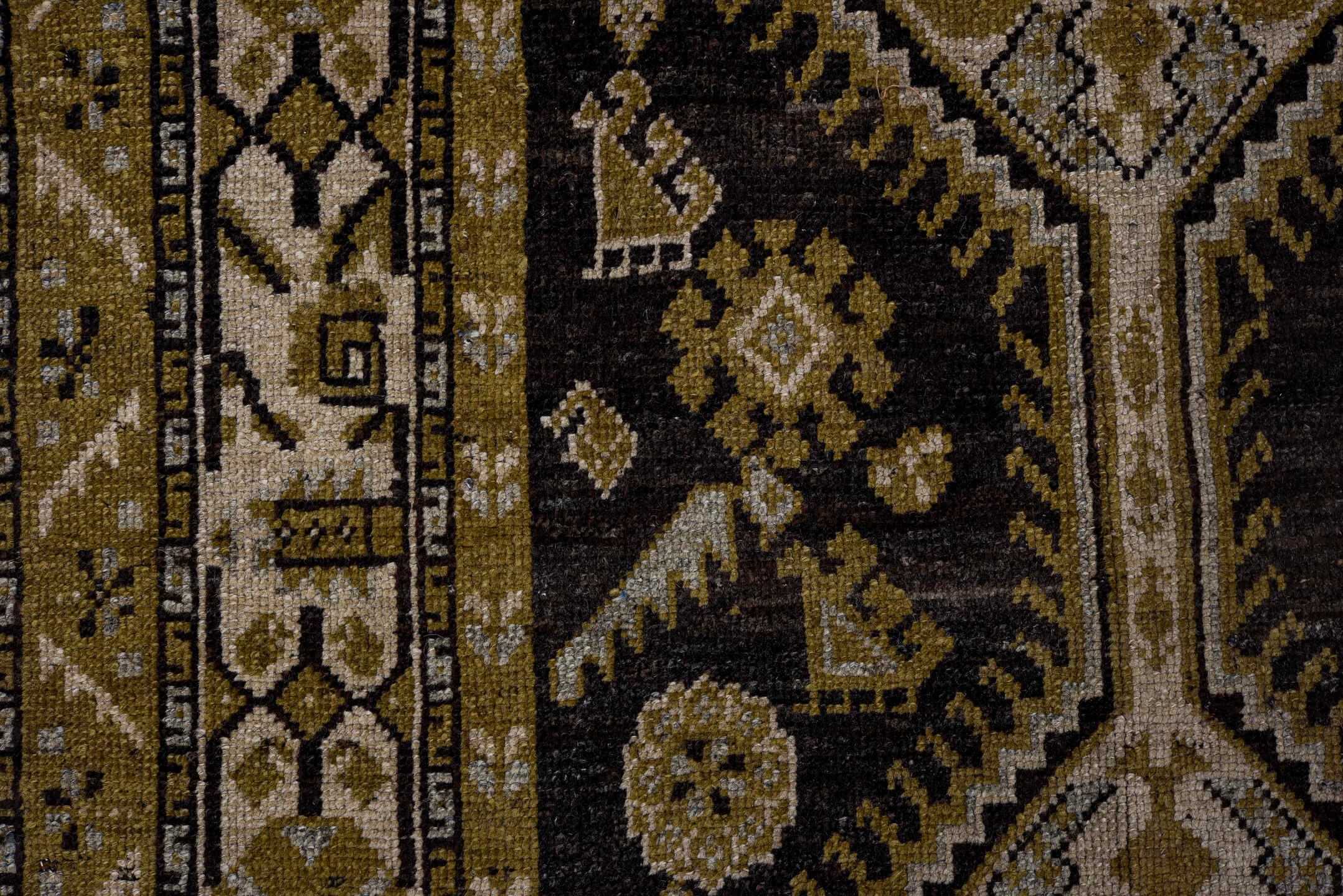 3' x 11' one-of-a-kind handmade vintage Kurd runner rug. Color palette: black, brown, charcoal, gray, light gray, off-white
