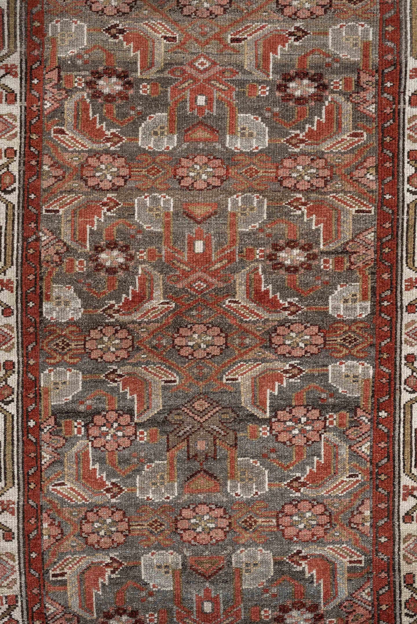 10' x 2' one-of-a-kind handmade vintage rug. Color palette: slate, rust, ivory, terracotta, rose, charcoal, taupe, gray