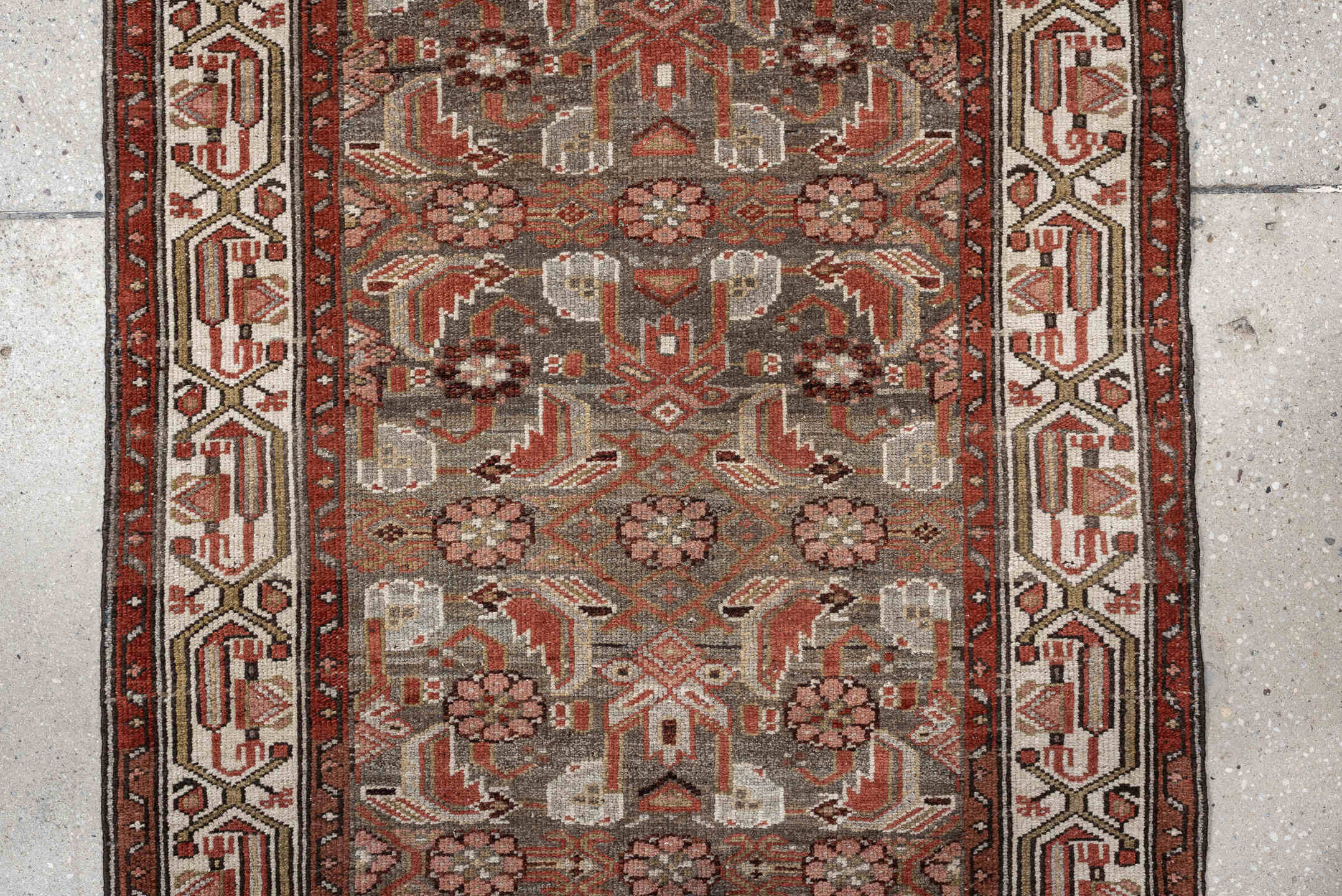 10' x 2' one-of-a-kind handmade vintage rug. Color palette: slate, rust, ivory, terracotta, rose, charcoal, taupe, gray