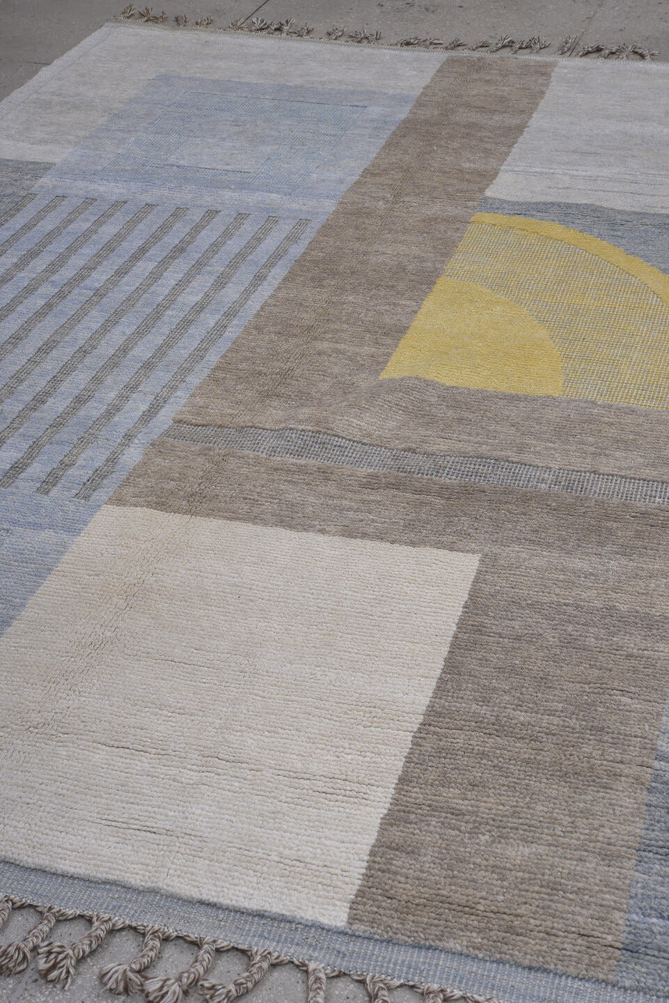 6' x 9' one-of-a-kind handmade vintage Tulu medium size rug. Color palette: pale blue, ivory, taupe, gray, muted gold