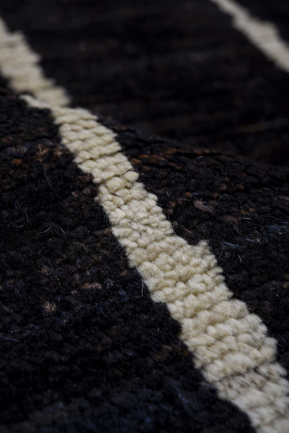 4' x 6' one-of-a-kind handmade vintage Tulu small size rug. Color palette: black, ivory