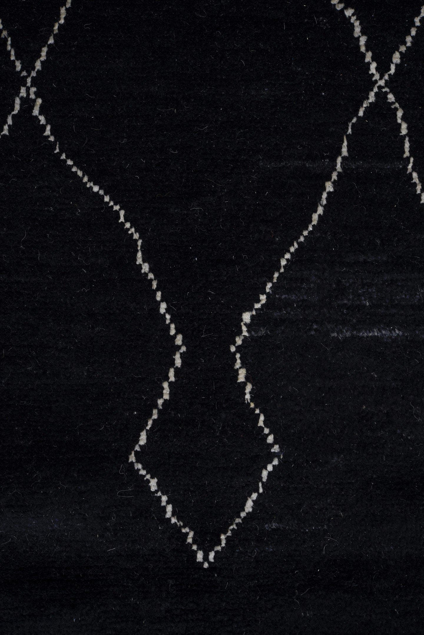 8' x 9' one-of-a-kind handmade vintage Tulu rug. Color palette: black, ivory