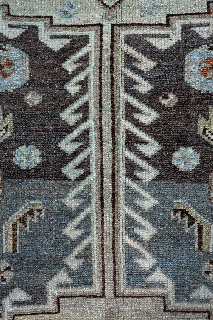 4' x 10' one-of-a-kind handmade antique Kurd runner rug. Color palette: blue, ivory, rust, charcoal, light blue, brown