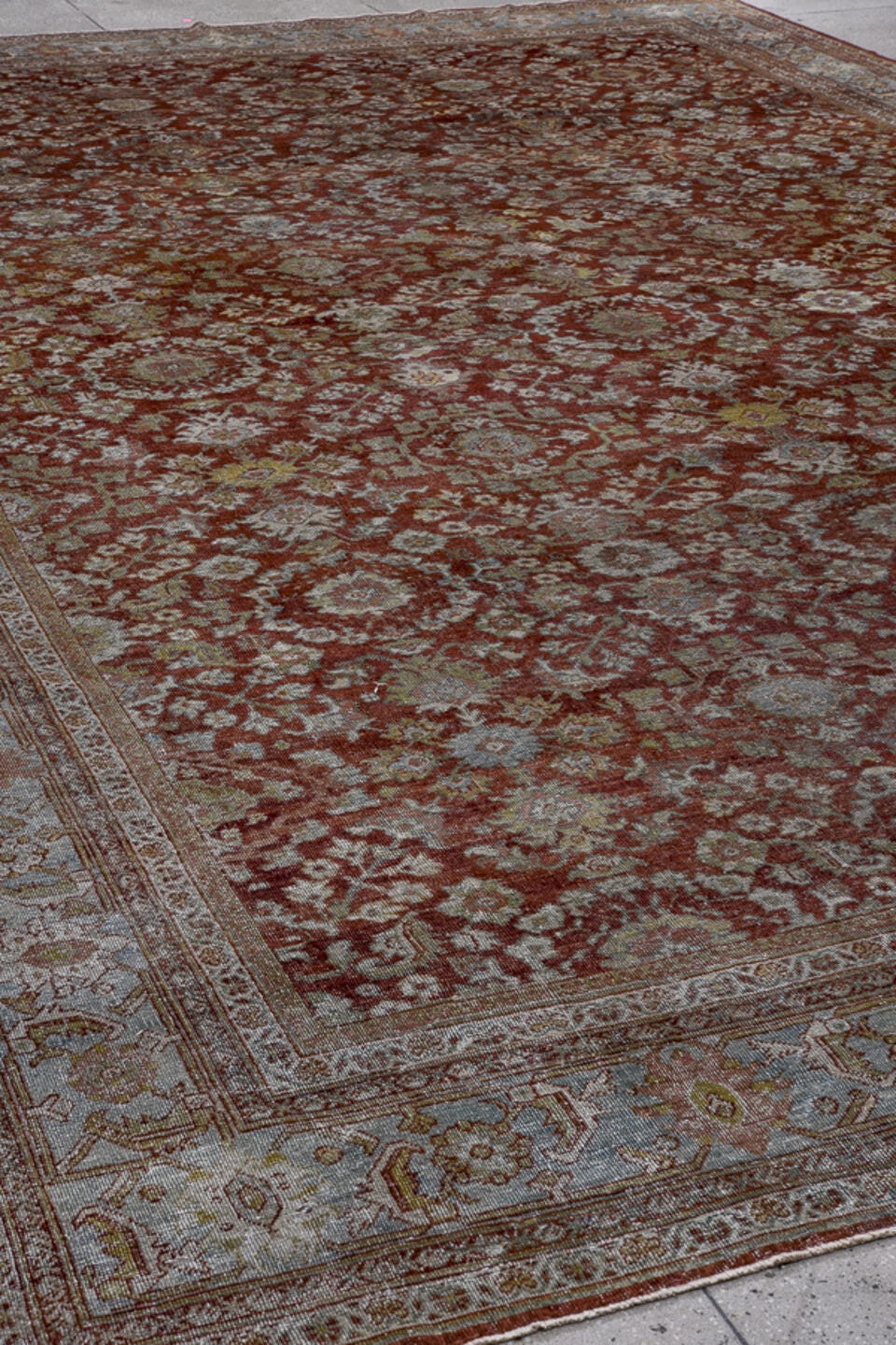 12' x 17' one-of-a-kind handmade vintage Sultanabad oversize rug. Color palette: rust, pale blue, ivory, taupe, sage, camel