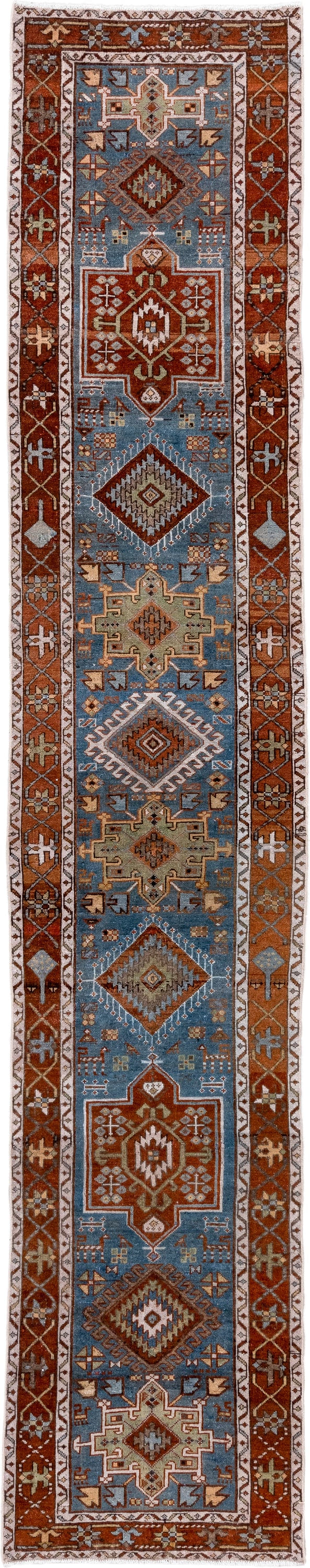 2' x 14' one-of-a-kind handmade vintage Heriz runner rug. Color palette: sky blue, rust, ivory, camel, taupe, brown