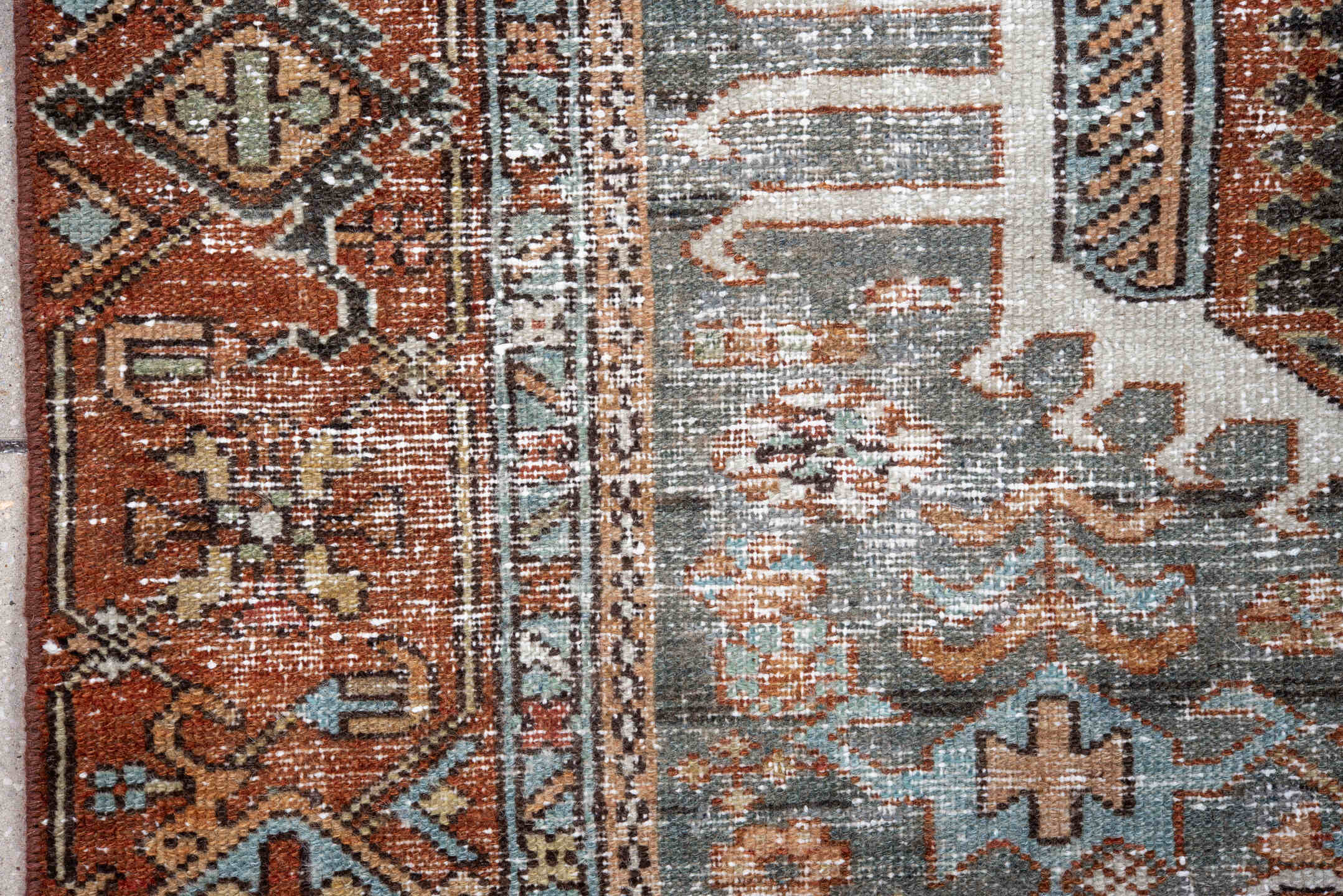 4' x 6' one-of-a-kind handmade antique Karaje small size rug. Color palette: rust, sky blue, ivory, sage, camel, charcoal