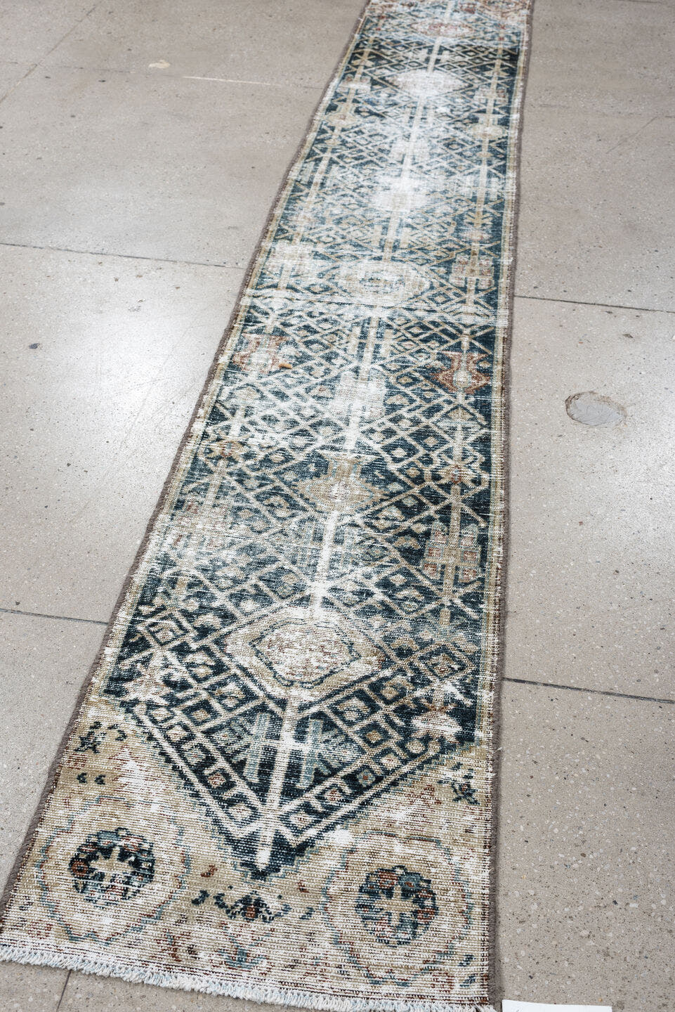1' x 10' one-of-a-kind handmade antique Malayer rug. Color palette: indigo, ivory, slate, taupe, rust, camel, blue gray