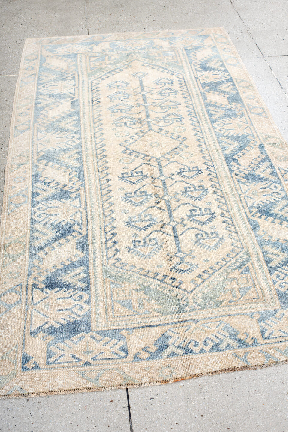 3' x 6' one-of-a-kind handmade antique Anatolian small size rug. Color palette: ivory, sky blue, beige, cream, pale blue