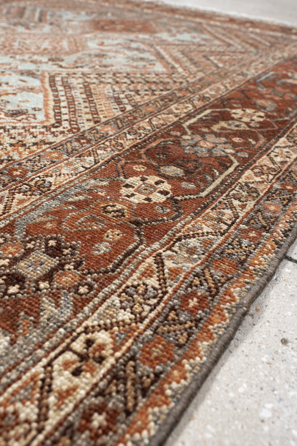 4' x 5' one-of-a-kind handmade antique Afshar small size rug. Color palette: rust, ivory, light blue, brown, camel, charcoal
