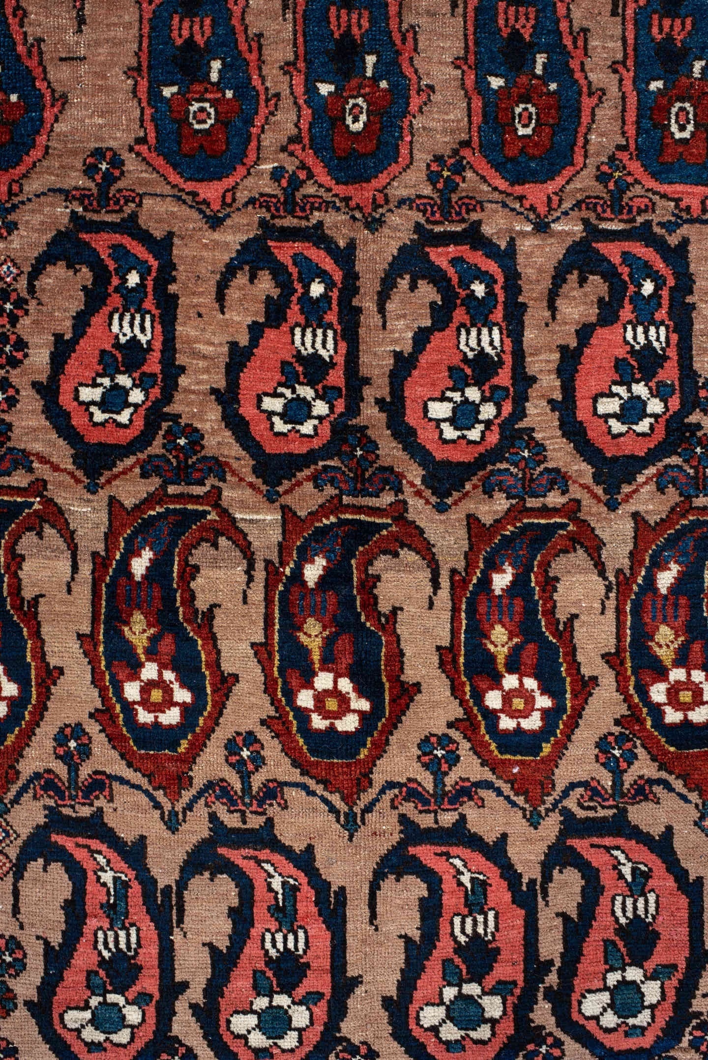 4' x 7' one-of-a-kind handmade antique Baktiary rug. Color palette: rust, indigo, ivory, brick, sky_blue, navy, cream, gold