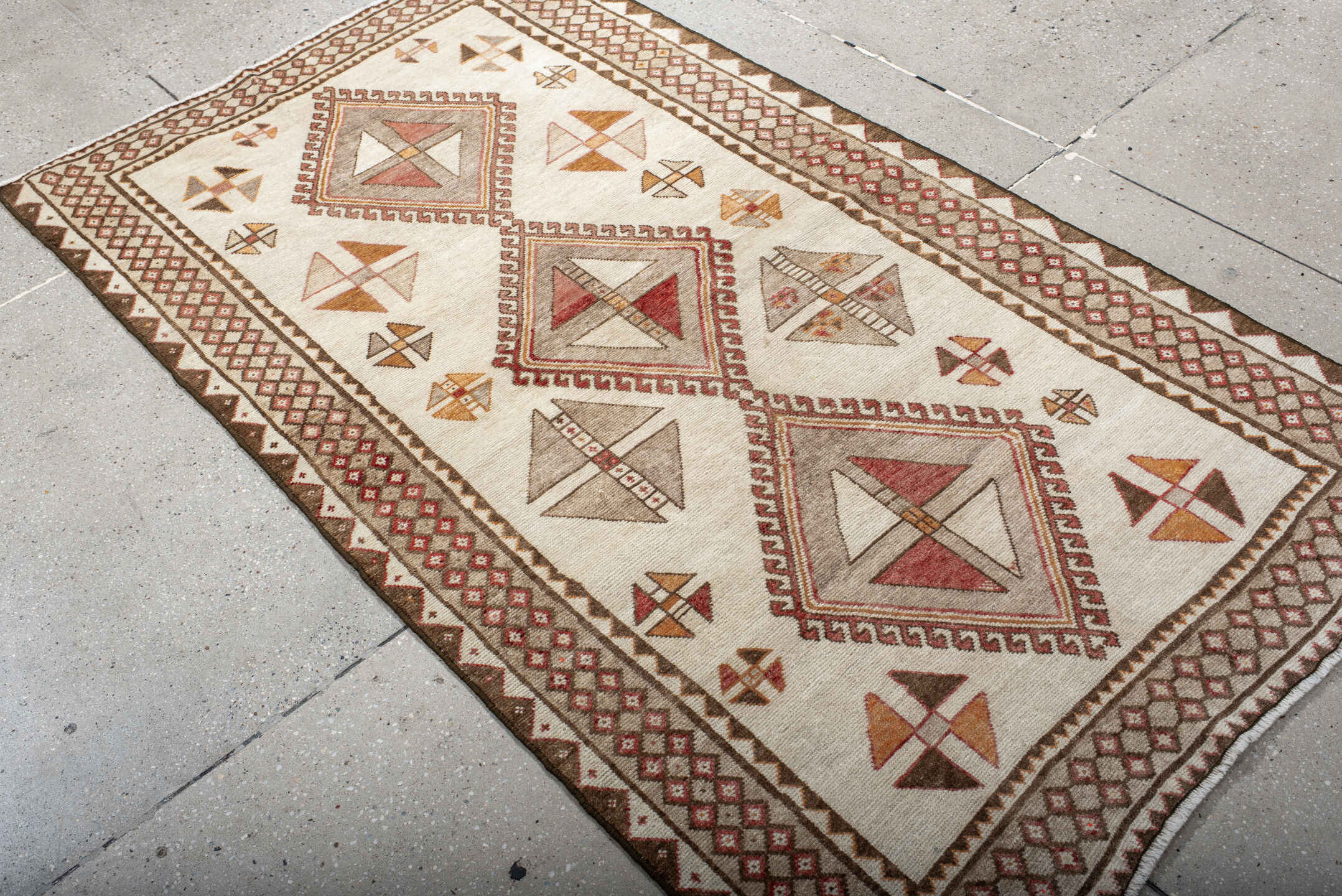 3' x 6' one-of-a-kind handmade antique Gabbe small size rug. Color palette: ivory, brown, rust, camel, taupe, terracotta