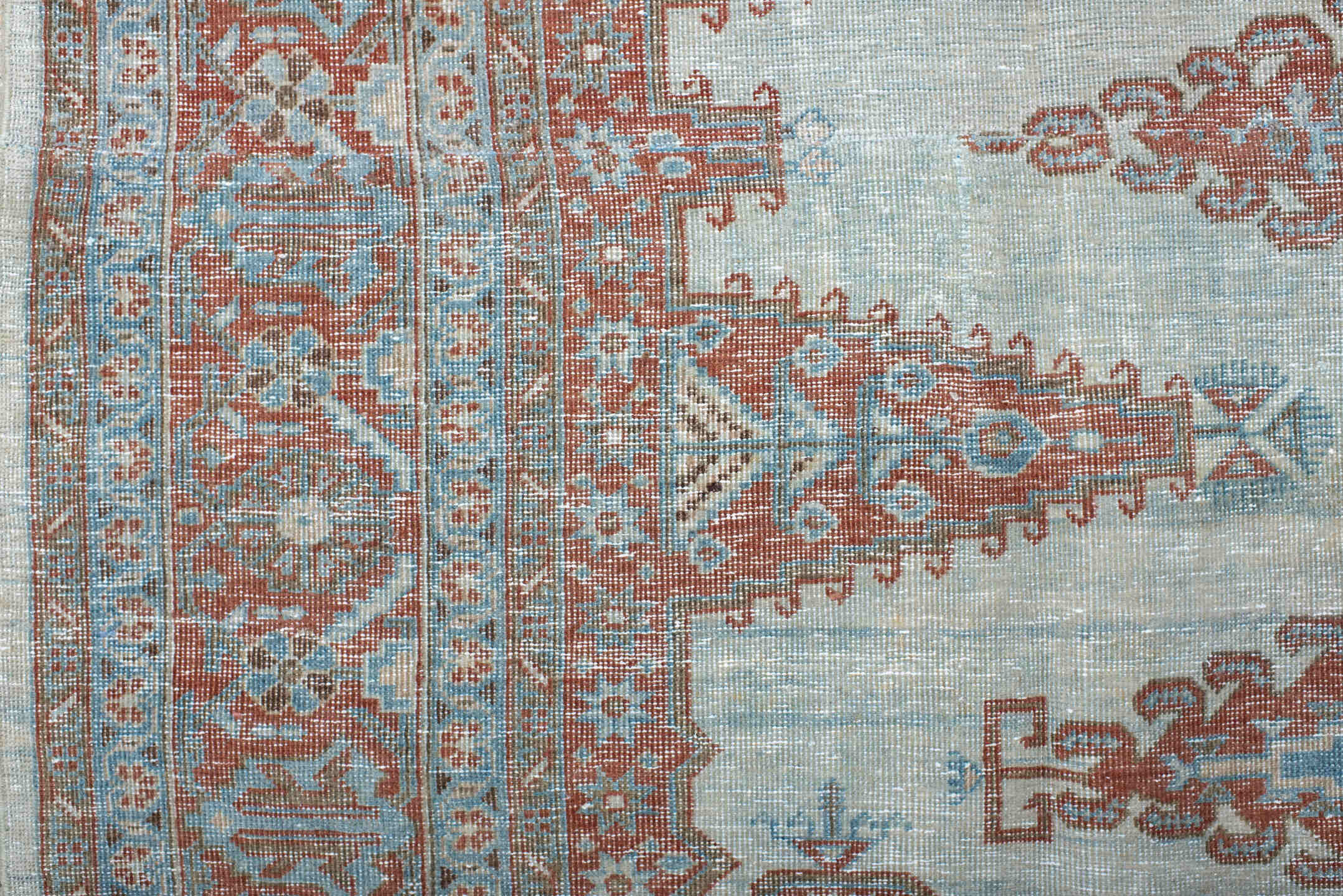 7' x 8' one-of-a-kind handmade antique Veece rug. Color palette: pale blue, rust, ivory, terracotta, sky blue, light blue