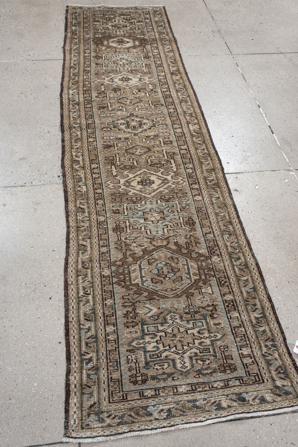 3' x 9' one-of-a-kind handmade antique Karaje runner rug. Color palette: taupe, brown, ivory, camel, slate, charcoal
