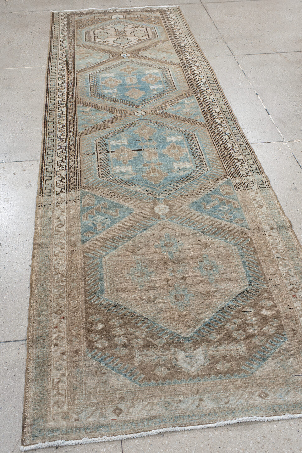 3' x 10' one-of-a-kind handmade antique Malayer runner rug. Color palette: ivory, sky blue, taupe, brown, beige, light blue
