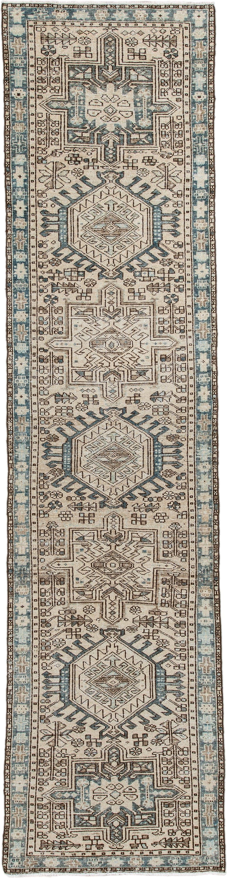 2' x 11' one-of-a-kind handmade antique Karaje runner rug. Color palette: ivory, sky blue, brown, taupe, camel, light blue
