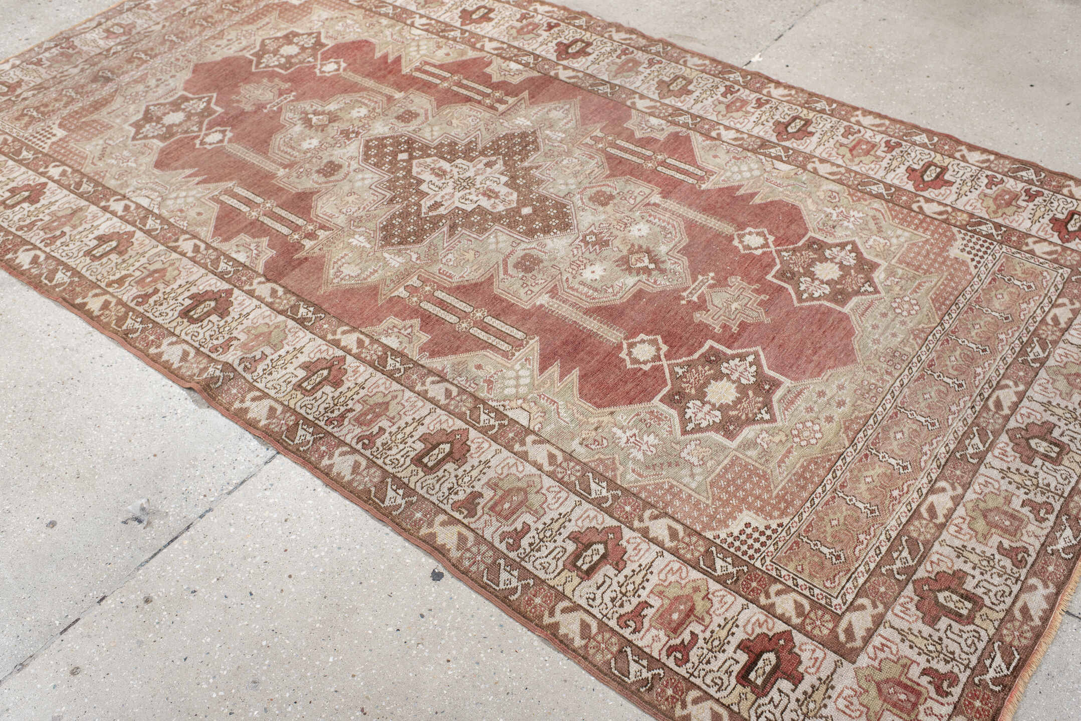 4' x 8' one-of-a-kind handmade vintage Anatolian rug. Color palette: terra cotta, ivory, sage, rust, taupe, rose, brown