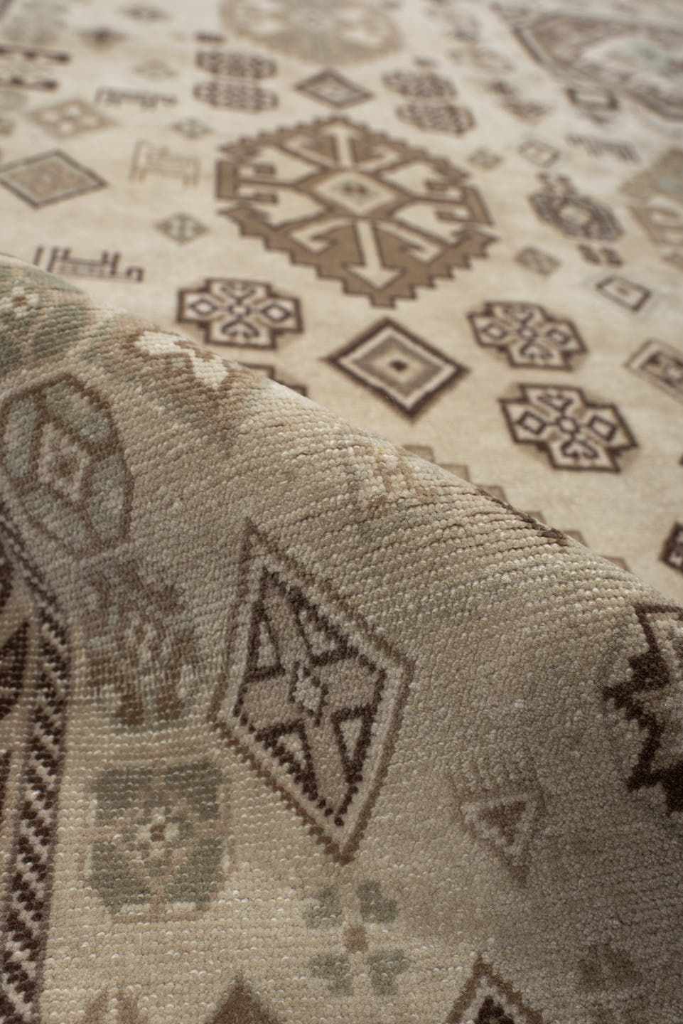 5' x 9' one-of-a-kind handmade vintage Ardebil medium size rug. Color palette: ivory, taupe, brown, camel, charcoal, greige