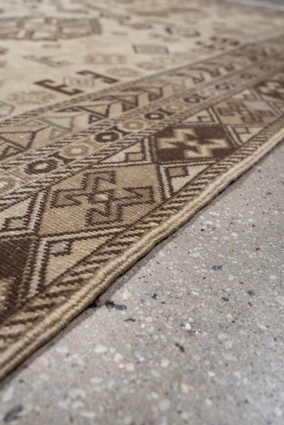5' x 9' one-of-a-kind handmade vintage Ardebil medium size rug. Color palette: ivory, taupe, brown, camel, charcoal, greige