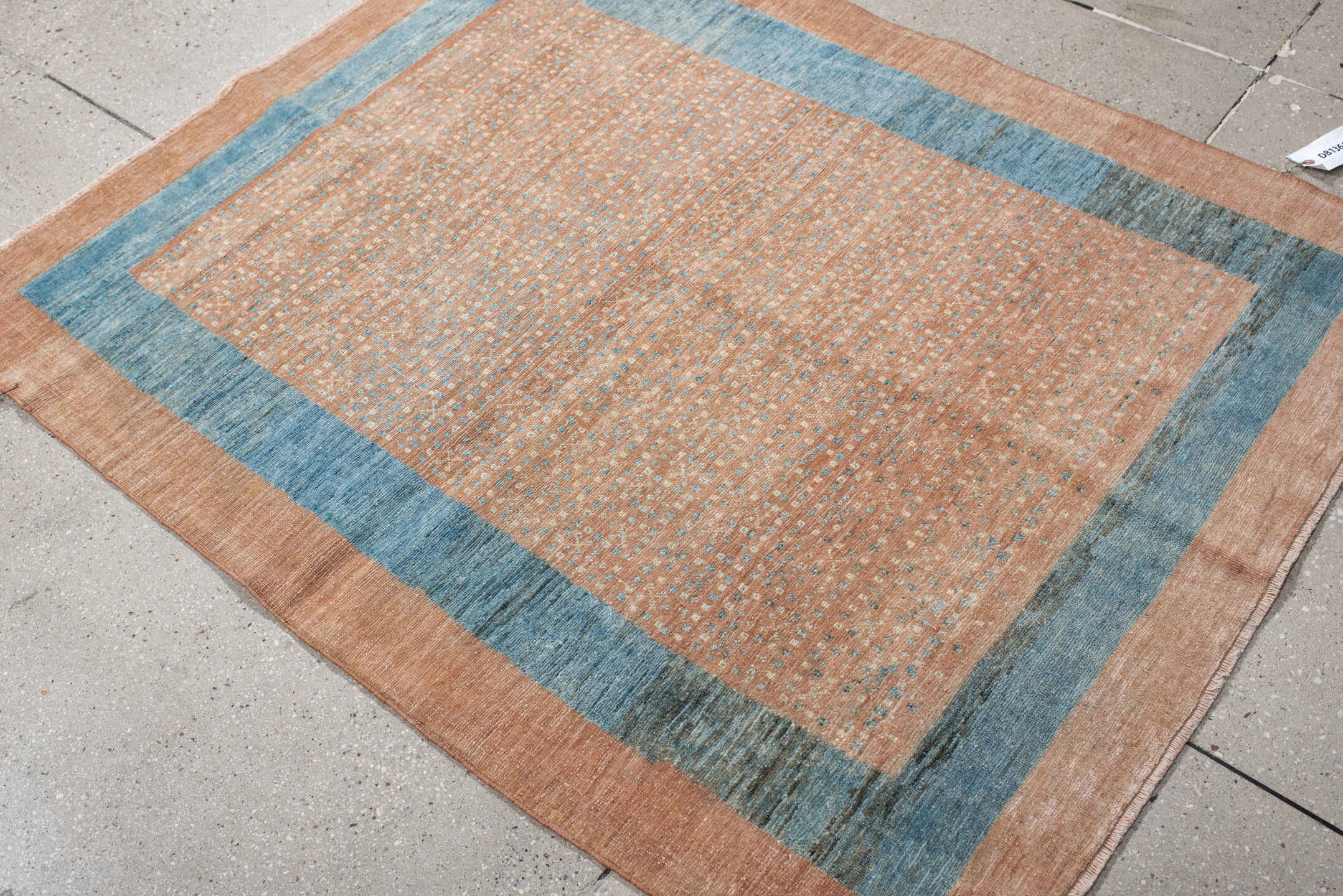 3' x 4' one-of-a-kind handmade vintage small size rug. Color palette: peach, teal, camel, taupe, ivory, slate, terracotta