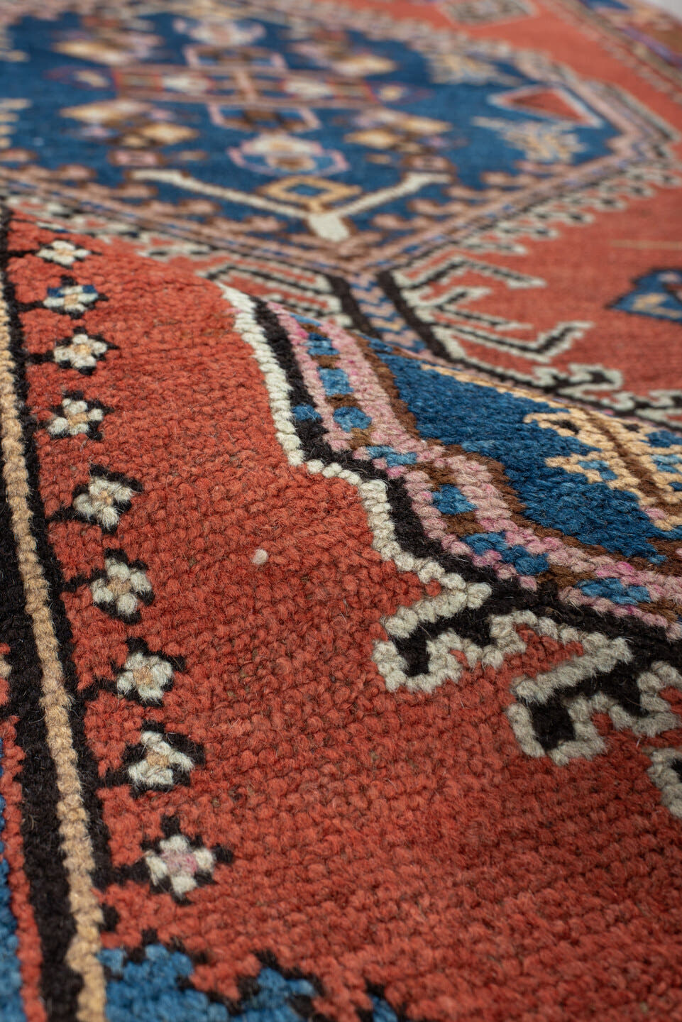 2' x 11' one-of-a-kind handmade vintage NW Persian runner rug. Color palette: terra cotta, navy, ivory, rust, sky blue
