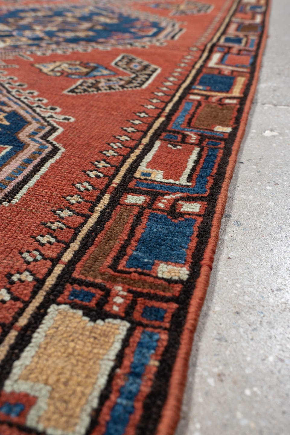 2' x 11' one-of-a-kind handmade vintage NW Persian runner rug. Color palette: terra cotta, navy, ivory, rust, sky blue
