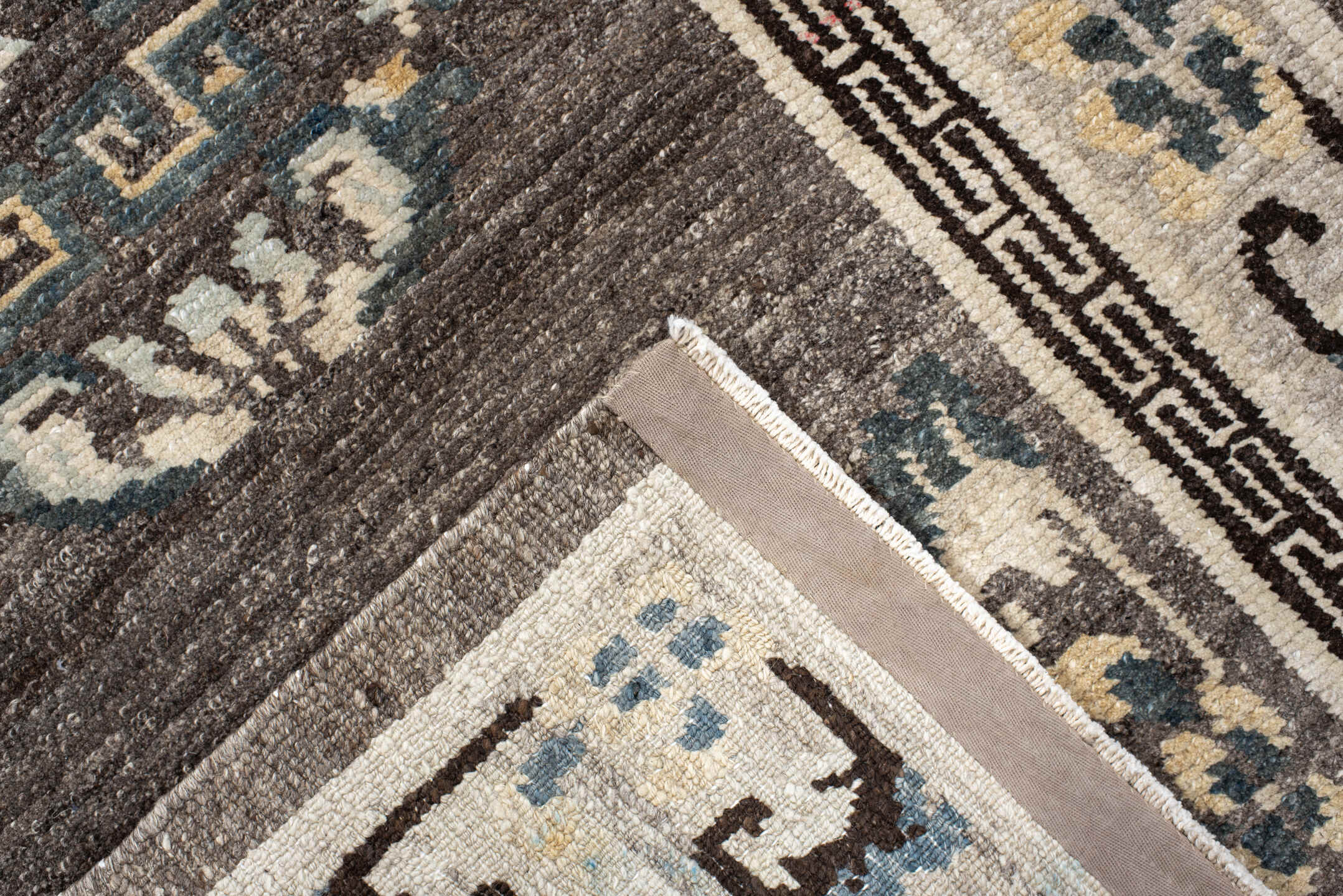 3' x 6' one-of-a-kind handmade antique Tibetan runner rug. Color palette: taupe, ivory, charcoal, slate, cream, gold, beige