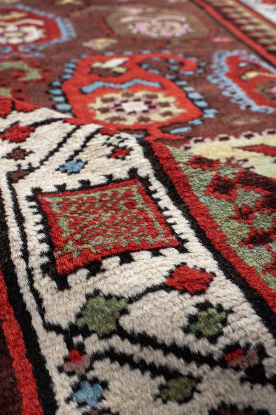 3' x 11' one-of-a-kind handmade antique Sarab runner rug. Color palette: rust, ivory, sky blue, crimson, brown, sage, pink