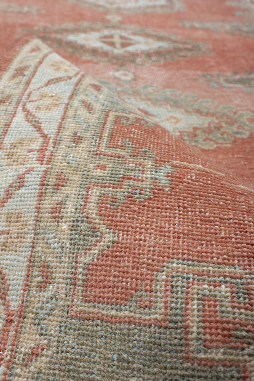 3' x 11' one-of-a-kind handmade antique Veece runner rug. Color palette: coral, ivory, pale blue, sage, cream, terra cotta