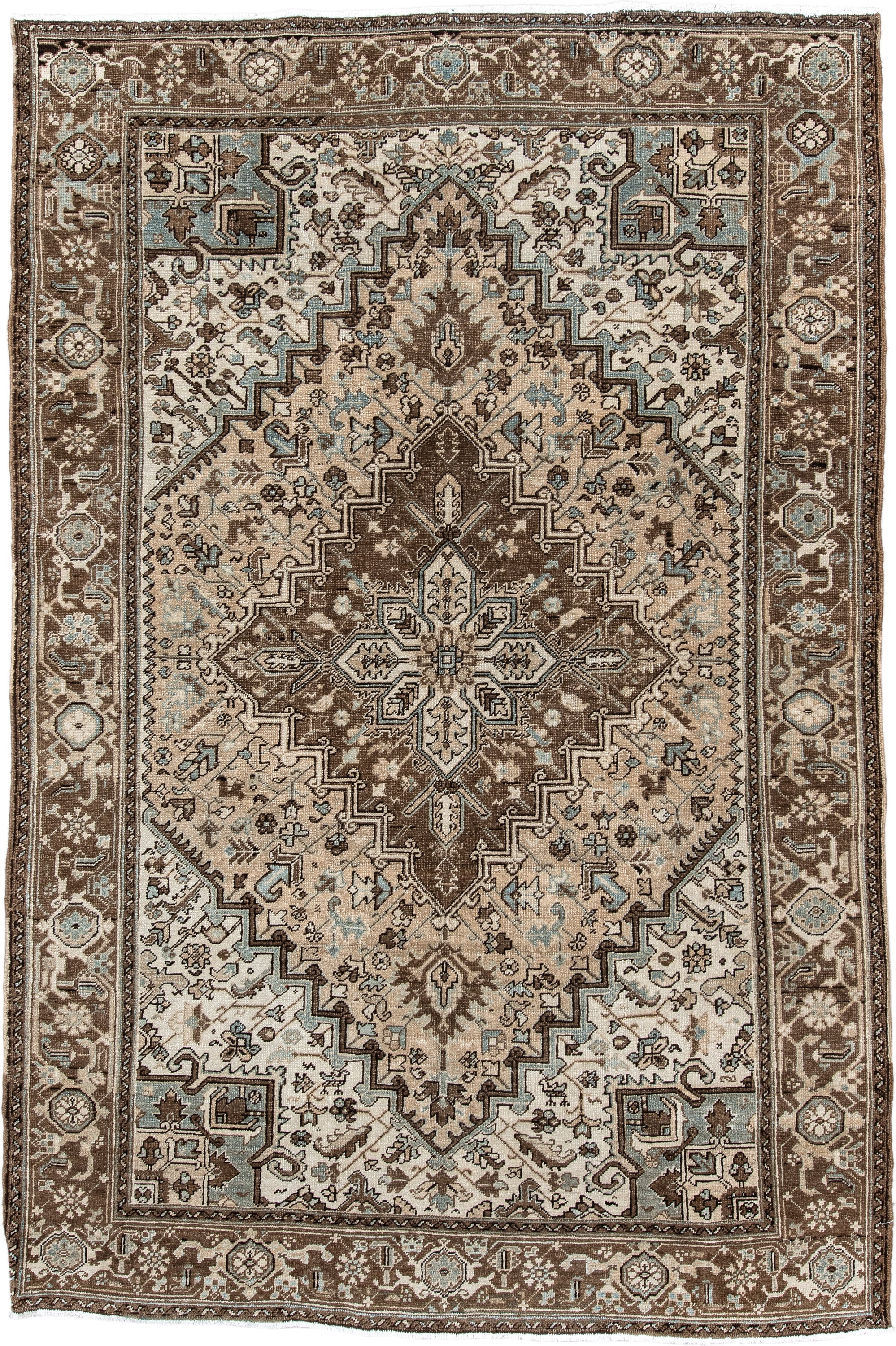 6' x 9' one-of-a-kind handmade antique Heriz medium size rug. Color palette: brown, ivory, sky blue, taupe, camel, slate