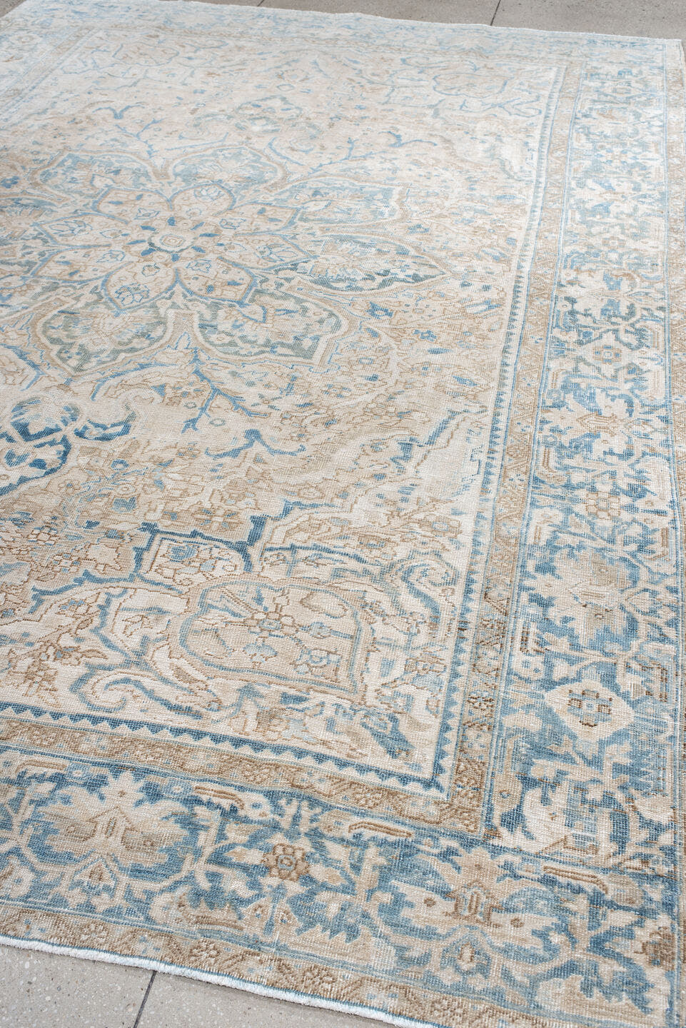 8' x 11' one-of-a-kind handmade antique Heriz large size rug. Color palette: ivory, pale blue, beige, sky blue, cream, taupe