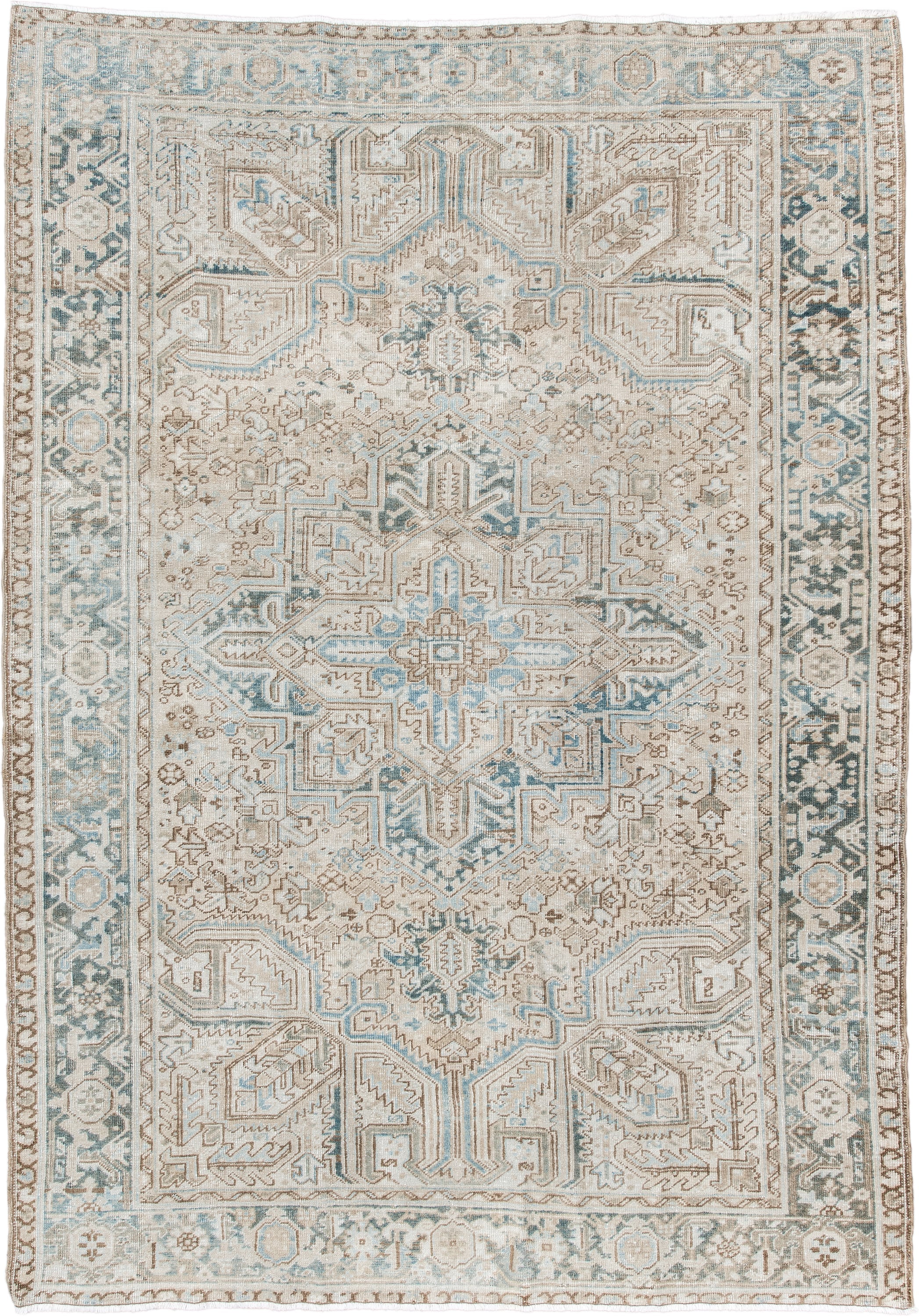 6' x 9' one-of-a-kind handmade antique Heriz medium size rug. Color palette: ivory, sky blue, taupe, beige, slate, camel