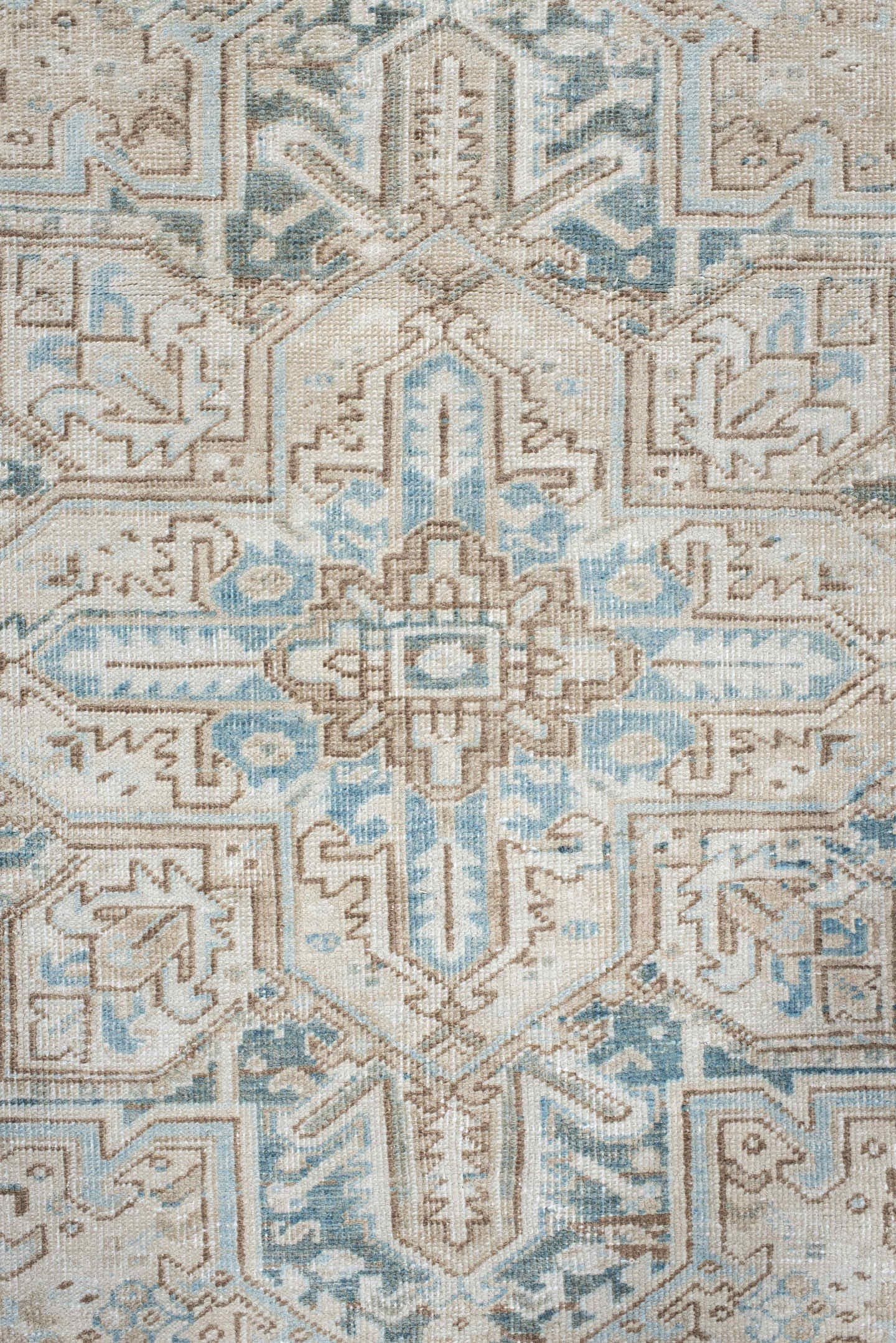 6' x 9' one-of-a-kind handmade antique Heriz medium size rug. Color palette: ivory, sky blue, taupe, beige, slate, camel
