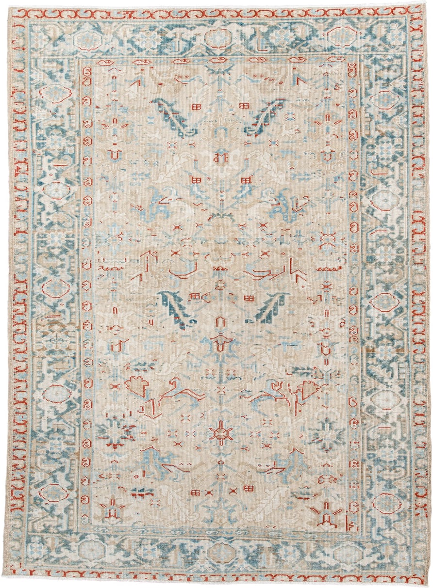 6' x 8' one-of-a-kind handmade antique Heriz medium size rug. Color palette: ivory, pale blue, rust, beige, sky blue