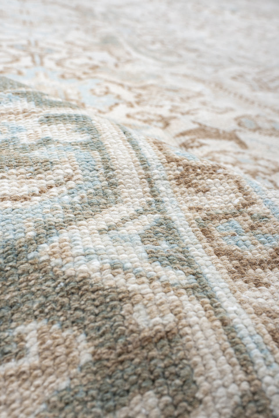 7' x 11' one-of-a-kind handmade antique Heriz large size rug. Color palette: ivory, pale aqua, camel, taupe, sage, cream