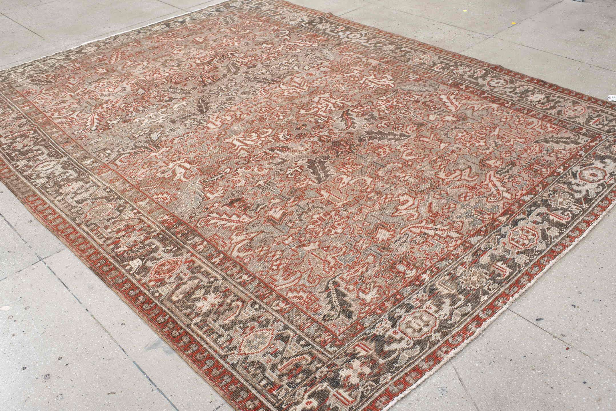 7' x 10' one-of-a-kind handmade antique Heriz large size rug. Color palette: taupe, ivory, charcoal, coral, brown, gray