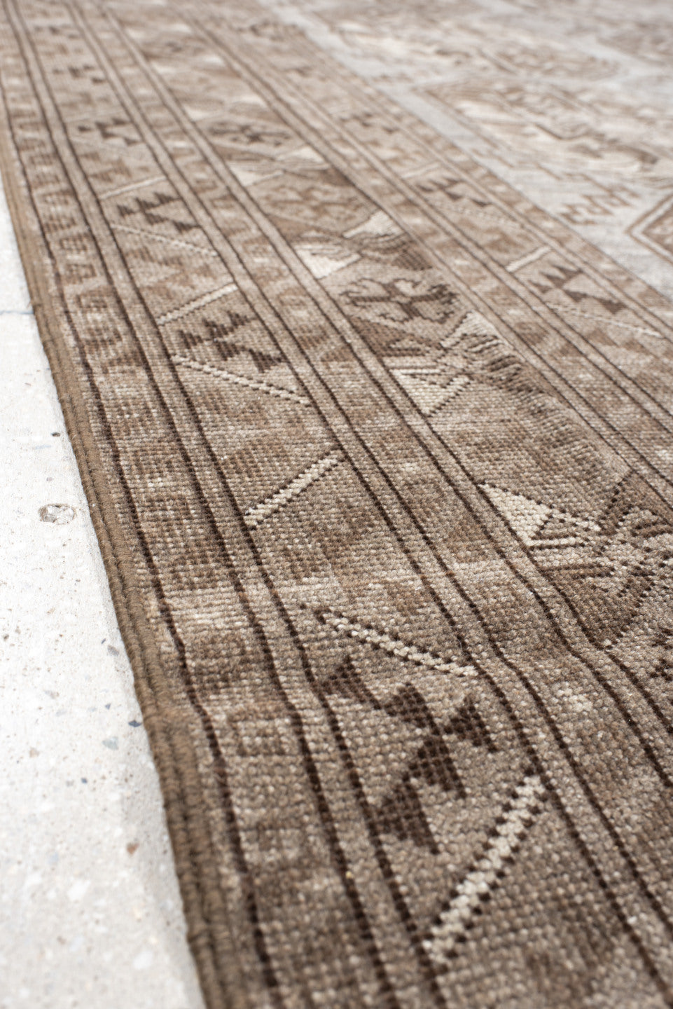 8' x 11' one-of-a-kind handmade vintage Afghan large size rug. Color palette: brown, dark gray, gray, light gray, off-white