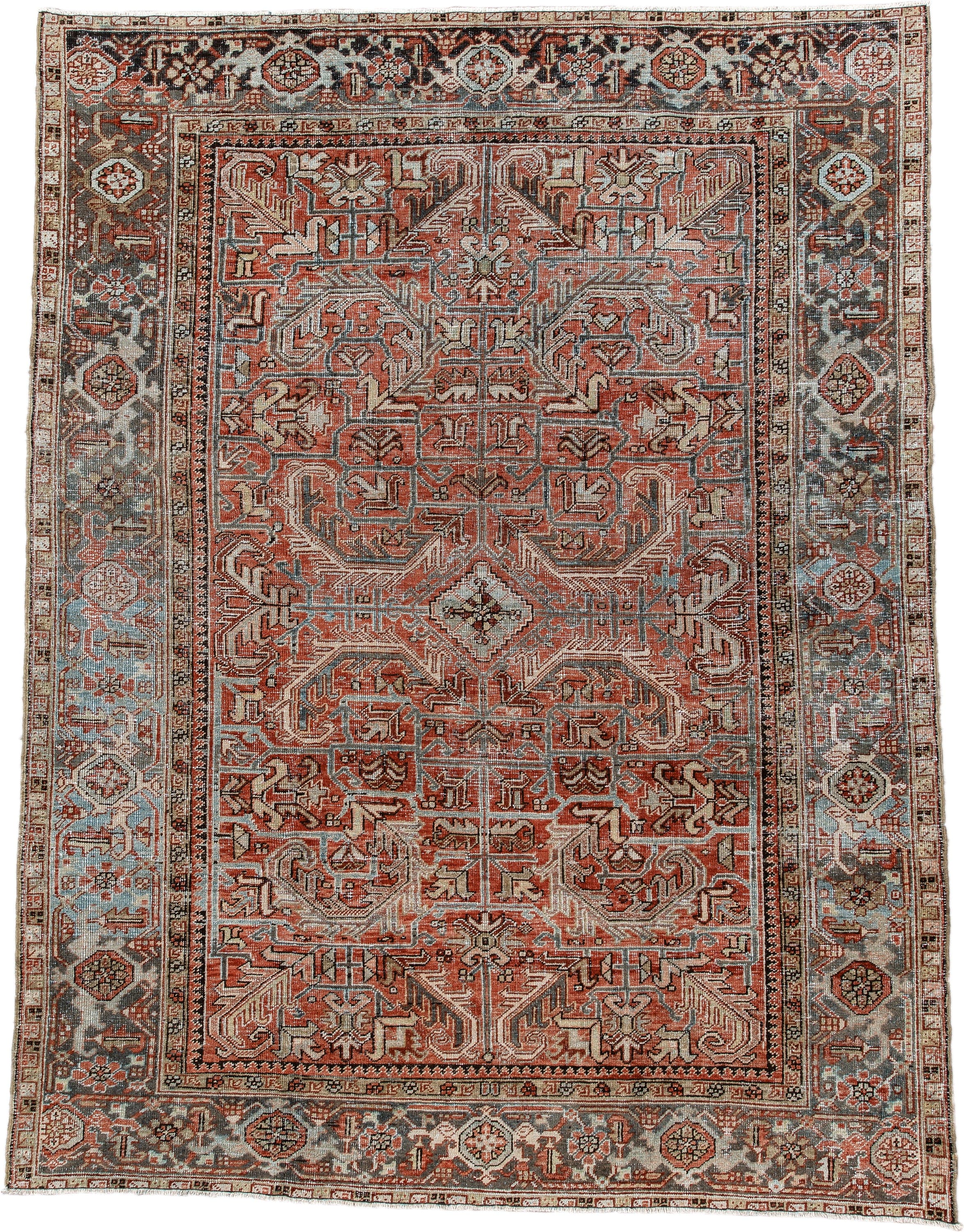 7' x 9' one-of-a-kind handmade antique Heriz large size rug. Color palette: terra cotta, ivory, slate, charcoal, rust, camel