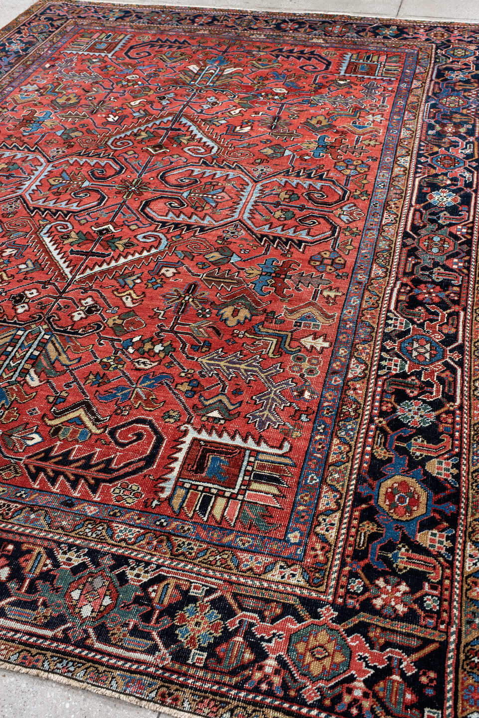8' x 10' one-of-a-kind handmade antique large size rug. Color palette: rust, navy, ivory, sky_blue, camel, slate, rose
