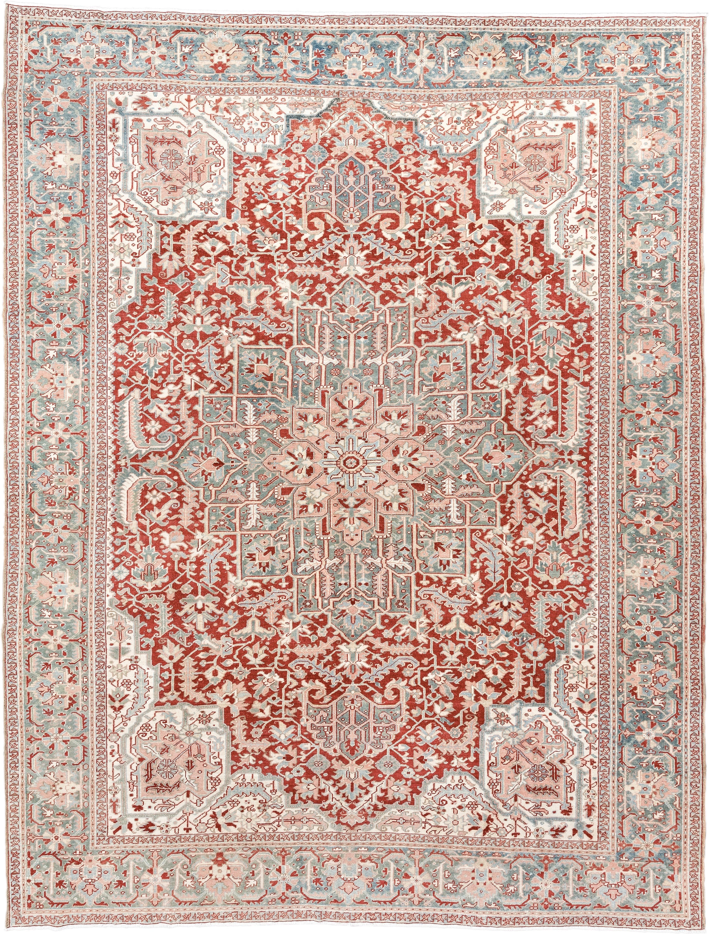 9' x 12' one-of-a-kind handmade antique Heriz large size rug. Color palette: rust, sky blue, ivory, terra cotta, sage, cream