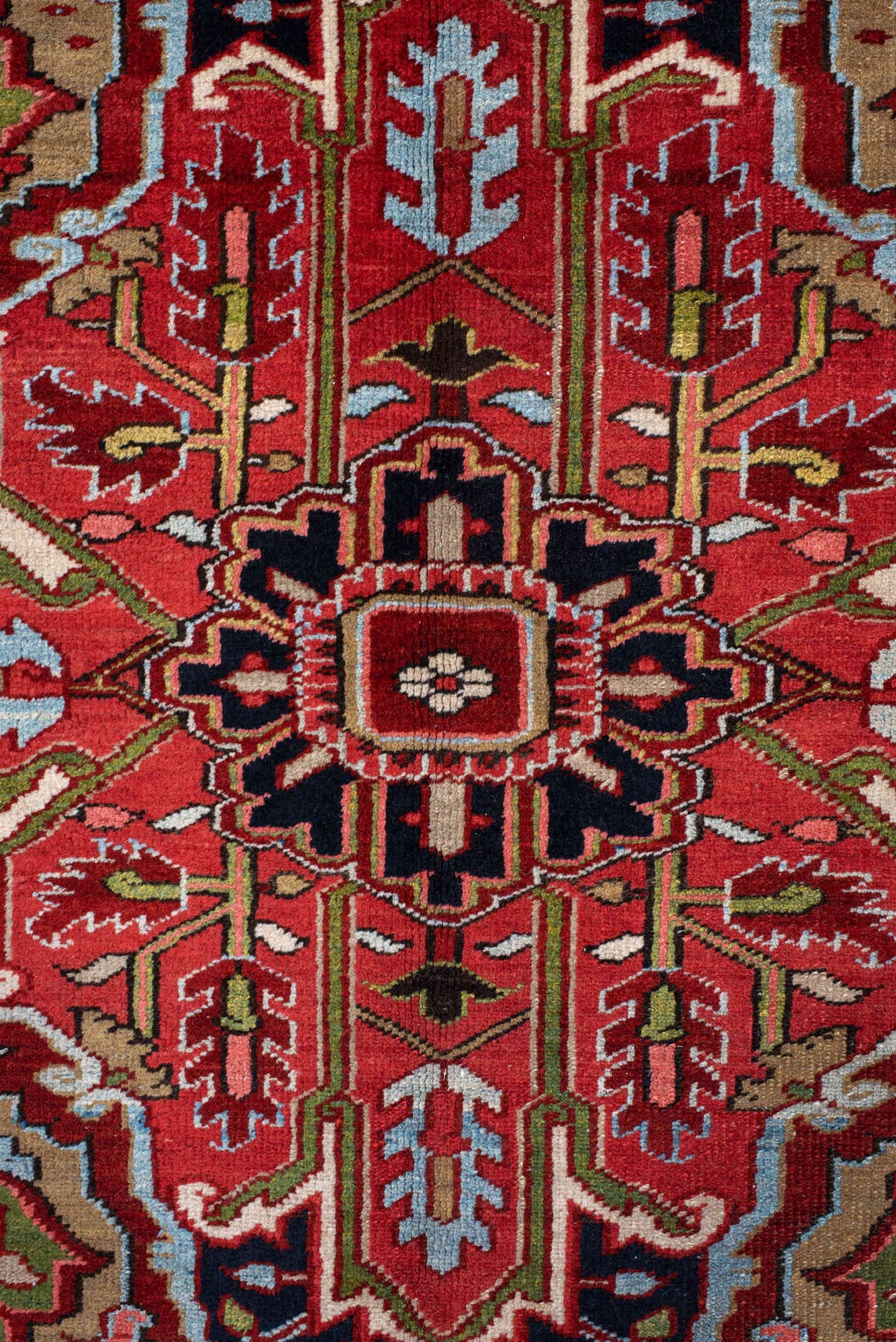 9' x 13' one-of-a-kind handmade antique Heriz large size rug. Color palette: rust, navy, ivory, brick, sage, sky blue, camel