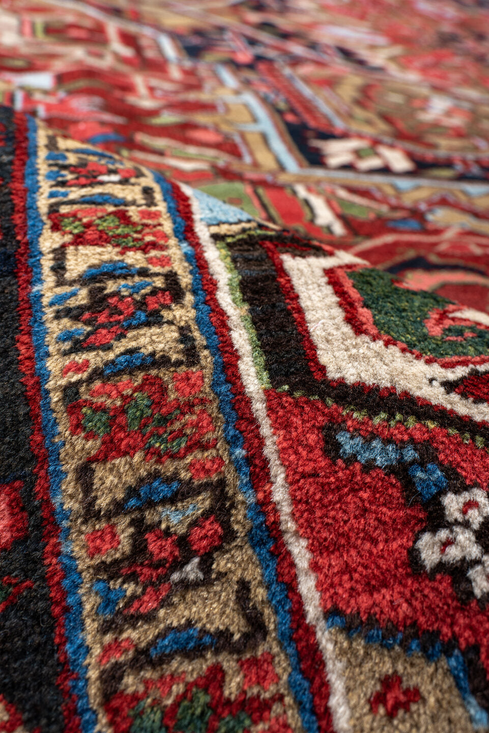 9' x 13' one-of-a-kind handmade antique Heriz large size rug. Color palette: rust, navy, ivory, brick, sage, sky blue, camel