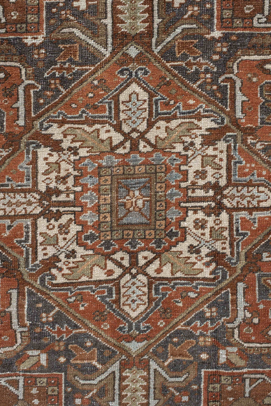 9' x 12' one-of-a-kind handmade antique Karaje large size rug. Color palette: rust, ivory, indigo, brown, terra cotta, slate