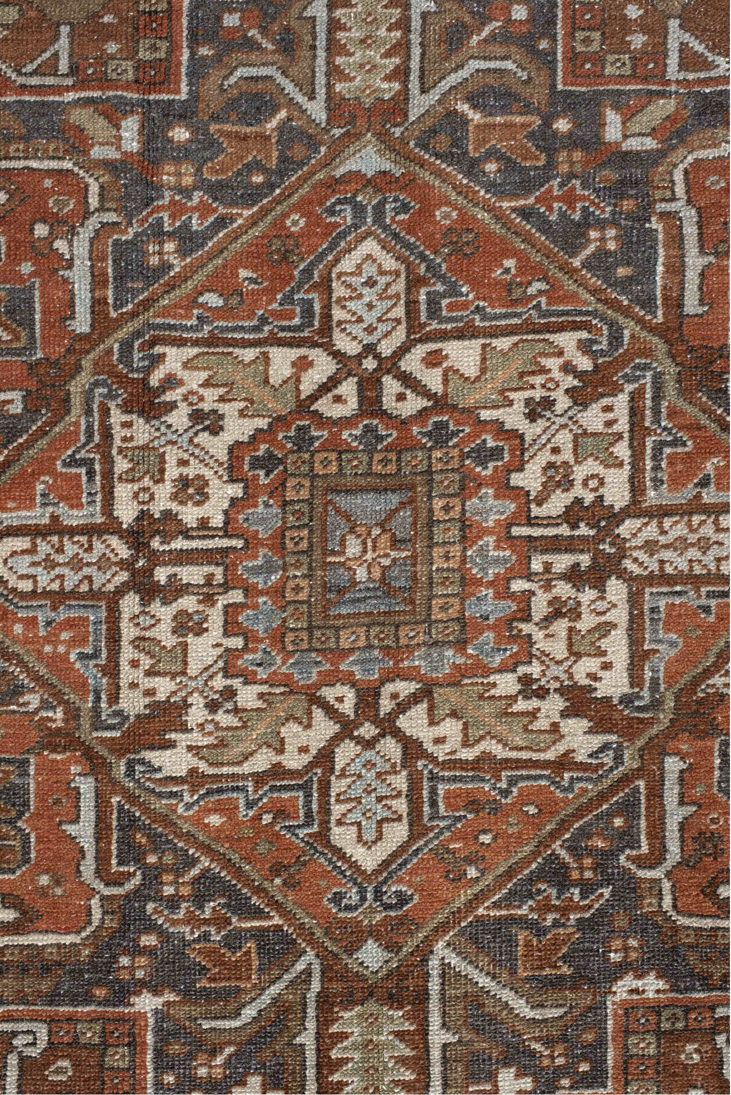 9' x 12' one-of-a-kind handmade antique Karaje large size rug. Color palette: rust, ivory, indigo, brown, terra cotta, slate