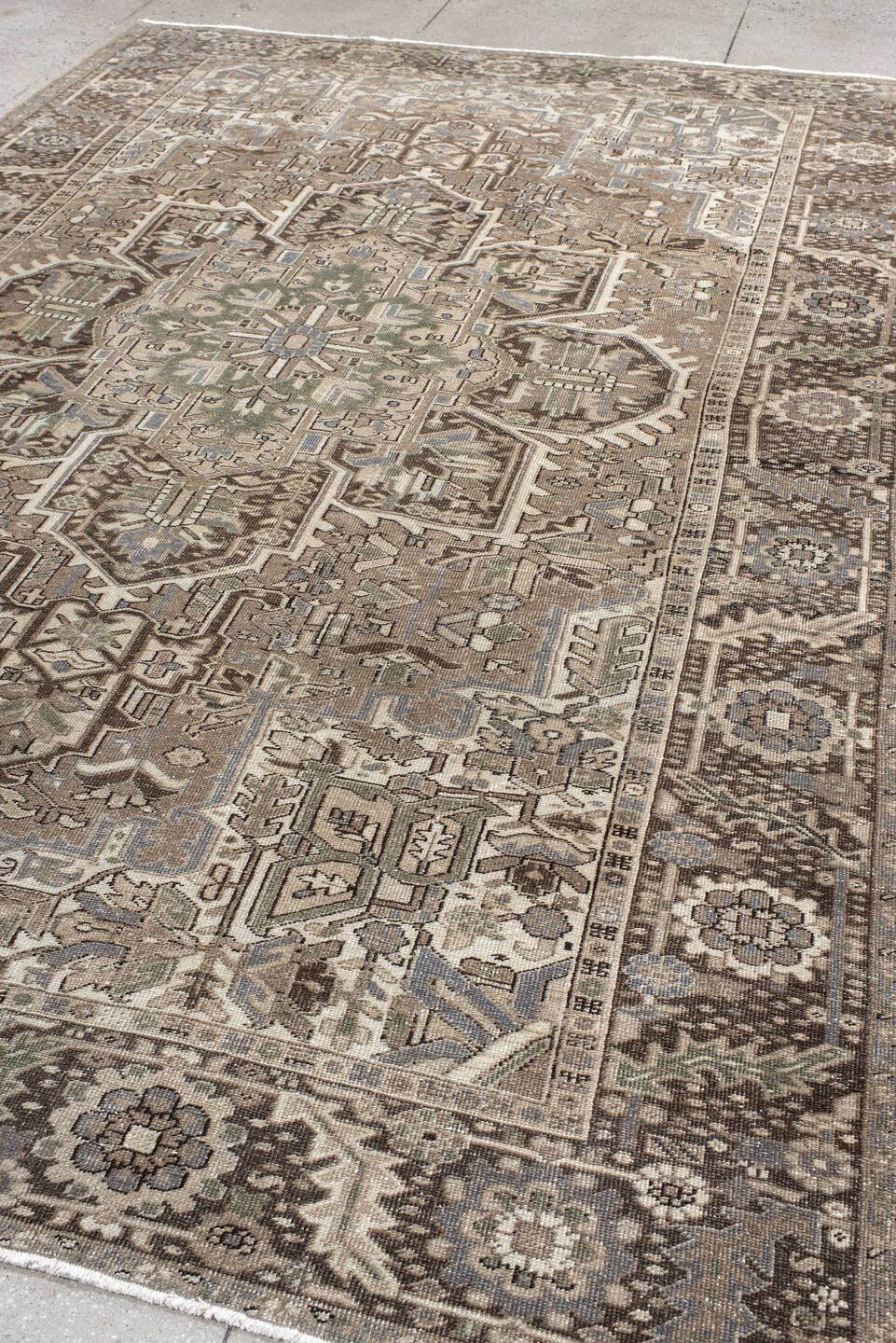 8' x 11' one-of-a-kind handmade antique Heriz large size rug. Color palette: taupe, brown, ivory, slate, sage, camel, beige