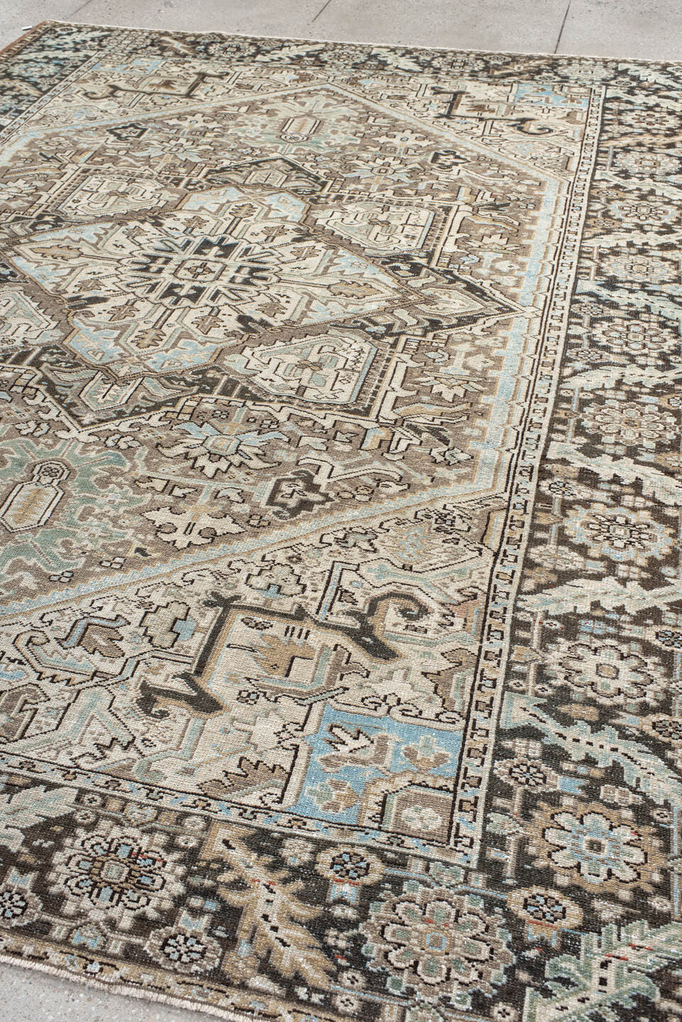8' x 10' one-of-a-kind handmade antique Karaje large size rug. Color palette: ivory, taupe, charcoal, sky_blue, camel, brown