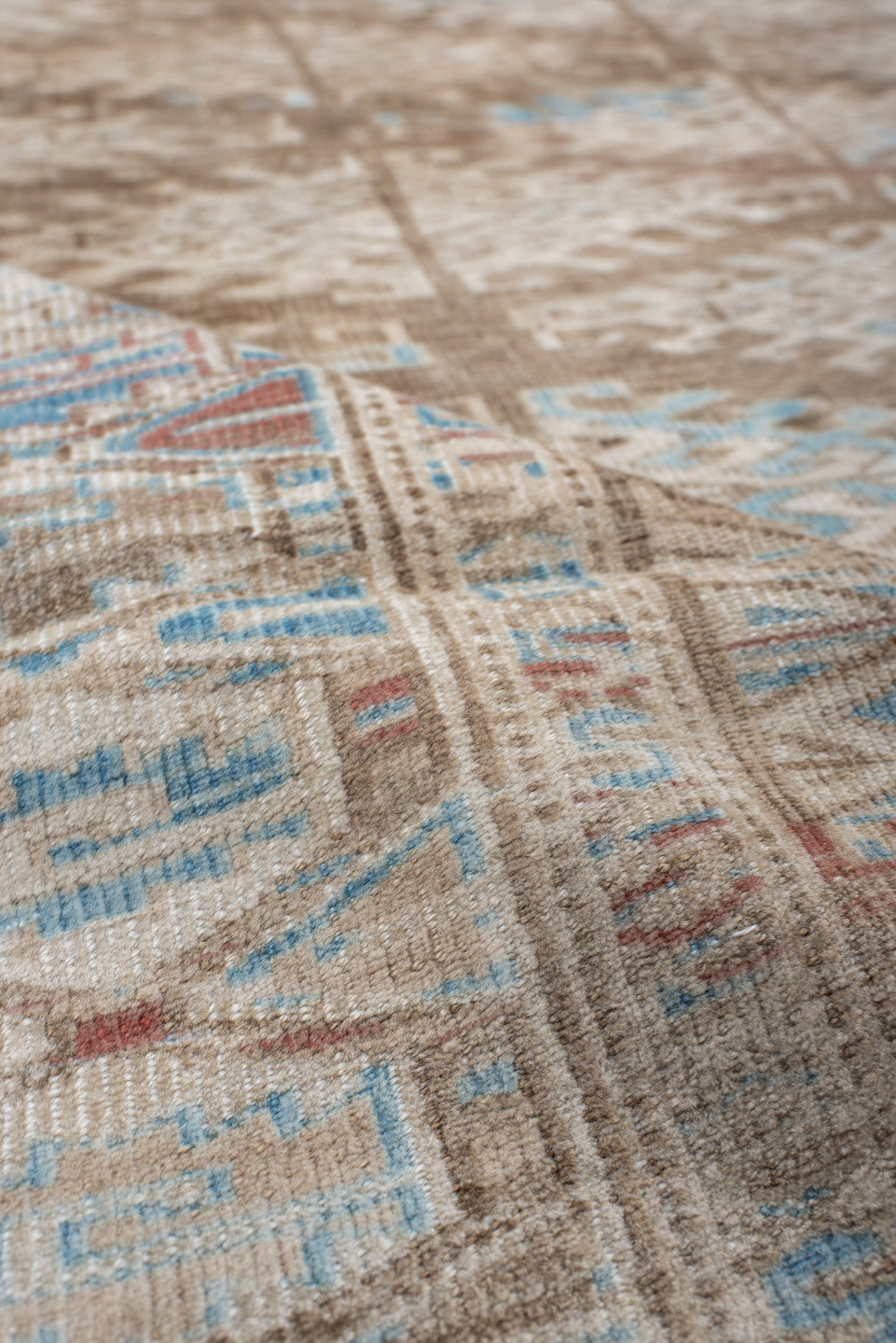 6' x 9' one-of-a-kind handmade antique Yamoud medium size rug. Color palette: ivory, taupe, camel, sky blue, brown, rose